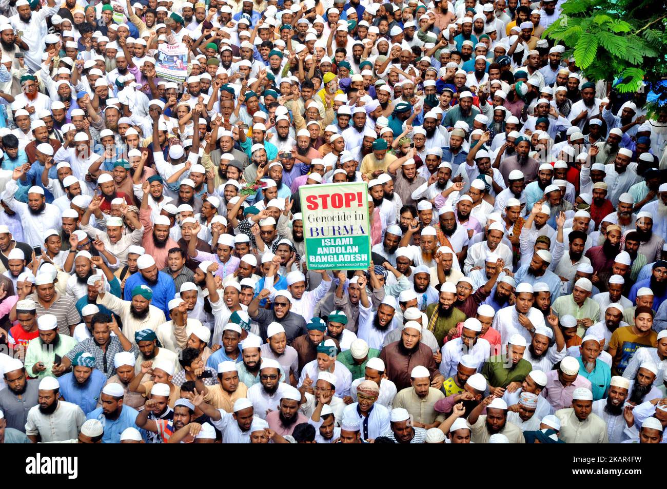 Bangladeshi Muslims protests at Baitul Makaram National Mosque in Dhaka, Bangladesh on September 8, 2017, demanding an end to the persecution of Rohingyas in Myanmar. Ganajagaran Mancha, a platform of youths in Bangladesh that campaigns for highest punishment for those found guilty in committing genocide and war crimes in the country's liberation war in 1971, came out on Friday demanding an end of genocide against Rohingyas in Myanmar. (Photo by Sony Ramany/NurPhoto) Stock Photo