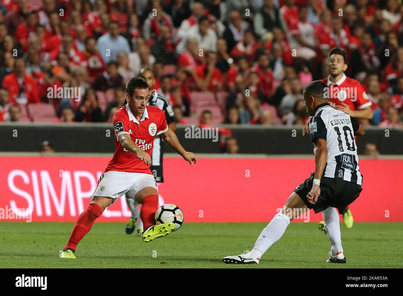 Benficas forward Andrija Zivkovic from Serbia (L) and Portimonenses midfielder Ewerton from Brazil (R) during the Premier League 2017/18 match between SL Benfica v Portimonense SC, at Luz Stadium in Lisbon, Portugal on September 8, 2017. (Photo by Bruno Barros / DPI / NurPhoto) Stock Photo