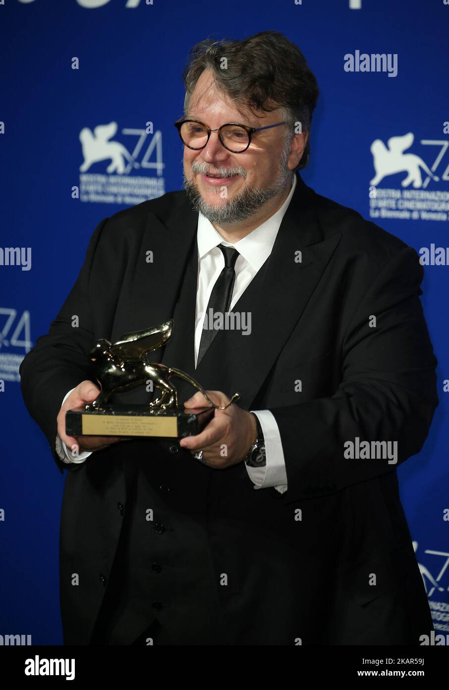 Guillermo del Toro poses with the Golden Lion for Best Film Award for 'The Shape Of Water' at the Award Winners photocall during the 74th Venice Film Festival in Venice, Italy on 9 September, 2017. (Photo by Matteo Chinellato/NurPhoto) Stock Photo