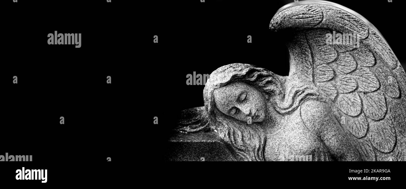 Sculpture of Angel with wings representing love faith and spiritual peace Stock Photo