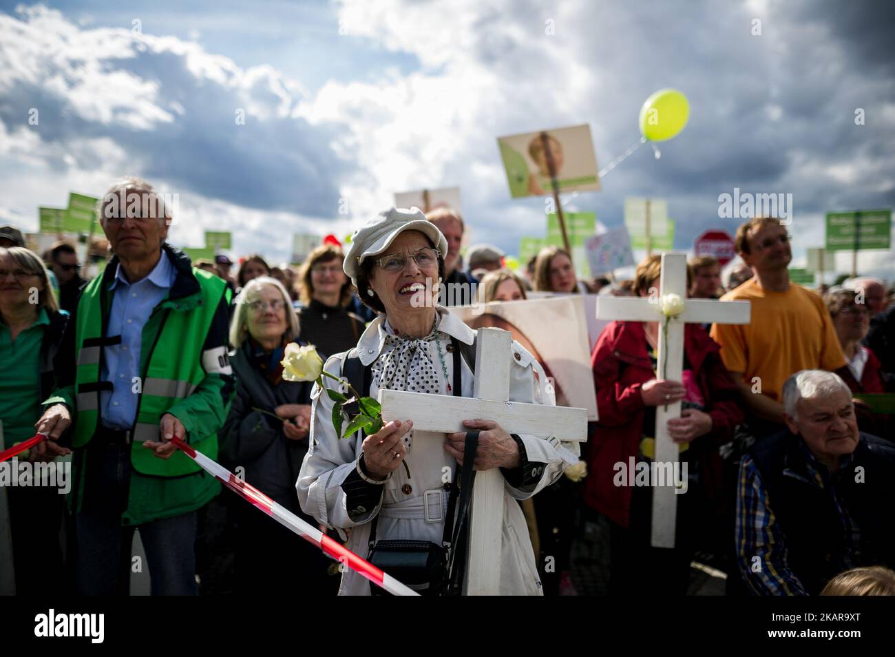 A participant in the demonstration listens to the speeches on the stage in Berlin, Germany on 16 September 2017. Under the motto 'Protect the most vulnerable, yes to every child', anti-abortionist and so-called 'lifeguards' move through Berlin. Critics accuse participants of religious fundamentalism. (Photo by Markus Heine/NurPhoto) Stock Photo