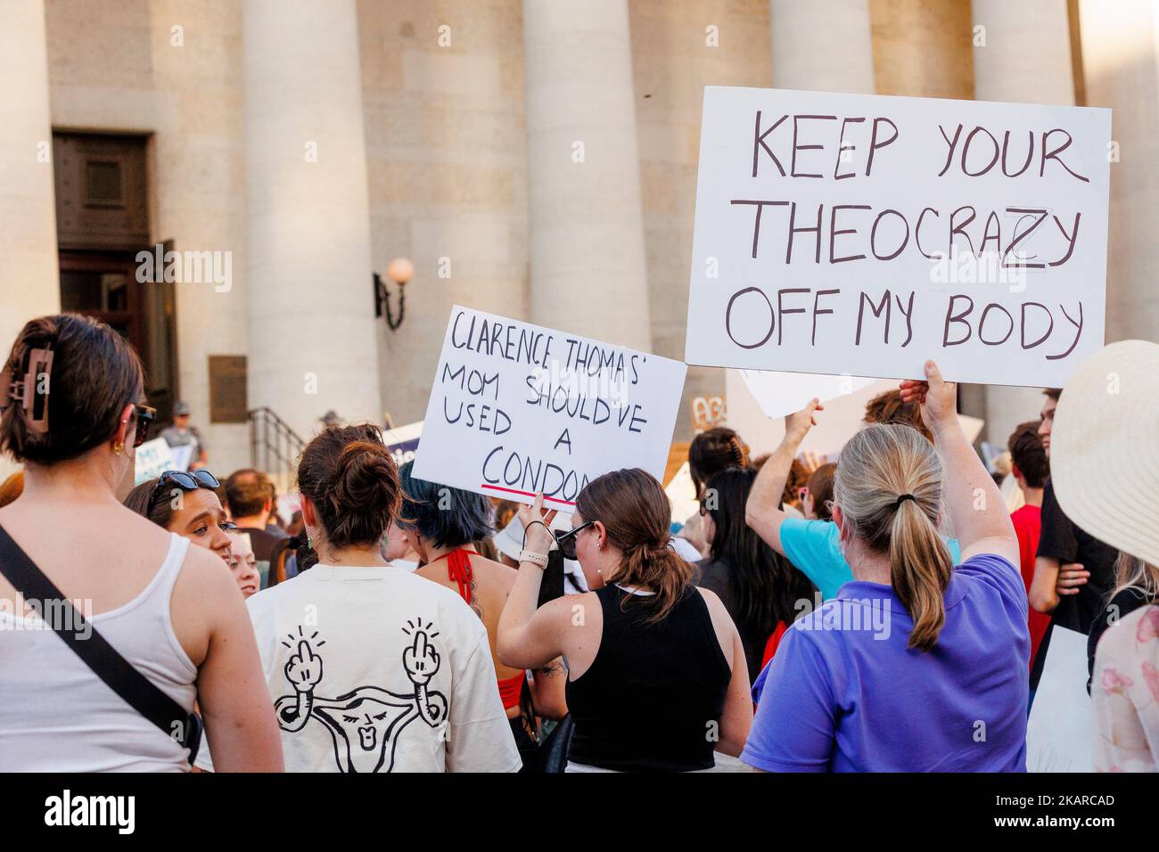 Rear view of woman protesting abortion rights outside Ohio State House Stock Photo