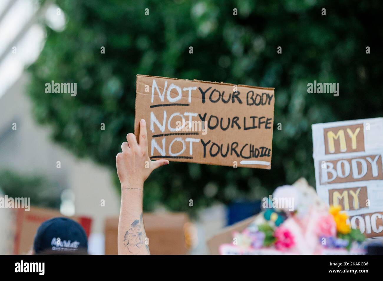 Close-up of hand holding pro-choice sign at abortion rights protest Stock Photo