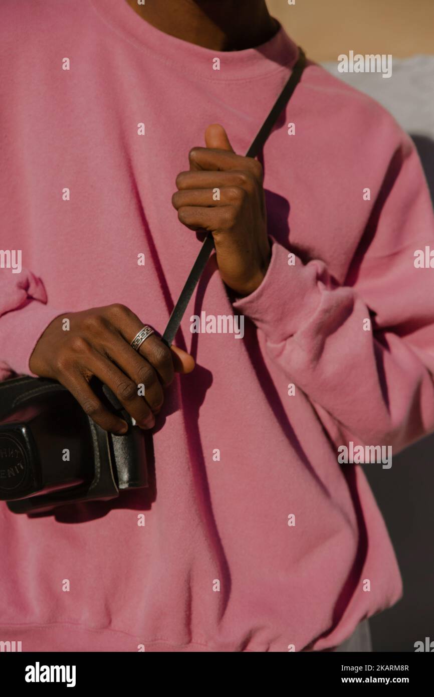 The guy in the pink sweater Stock Photo