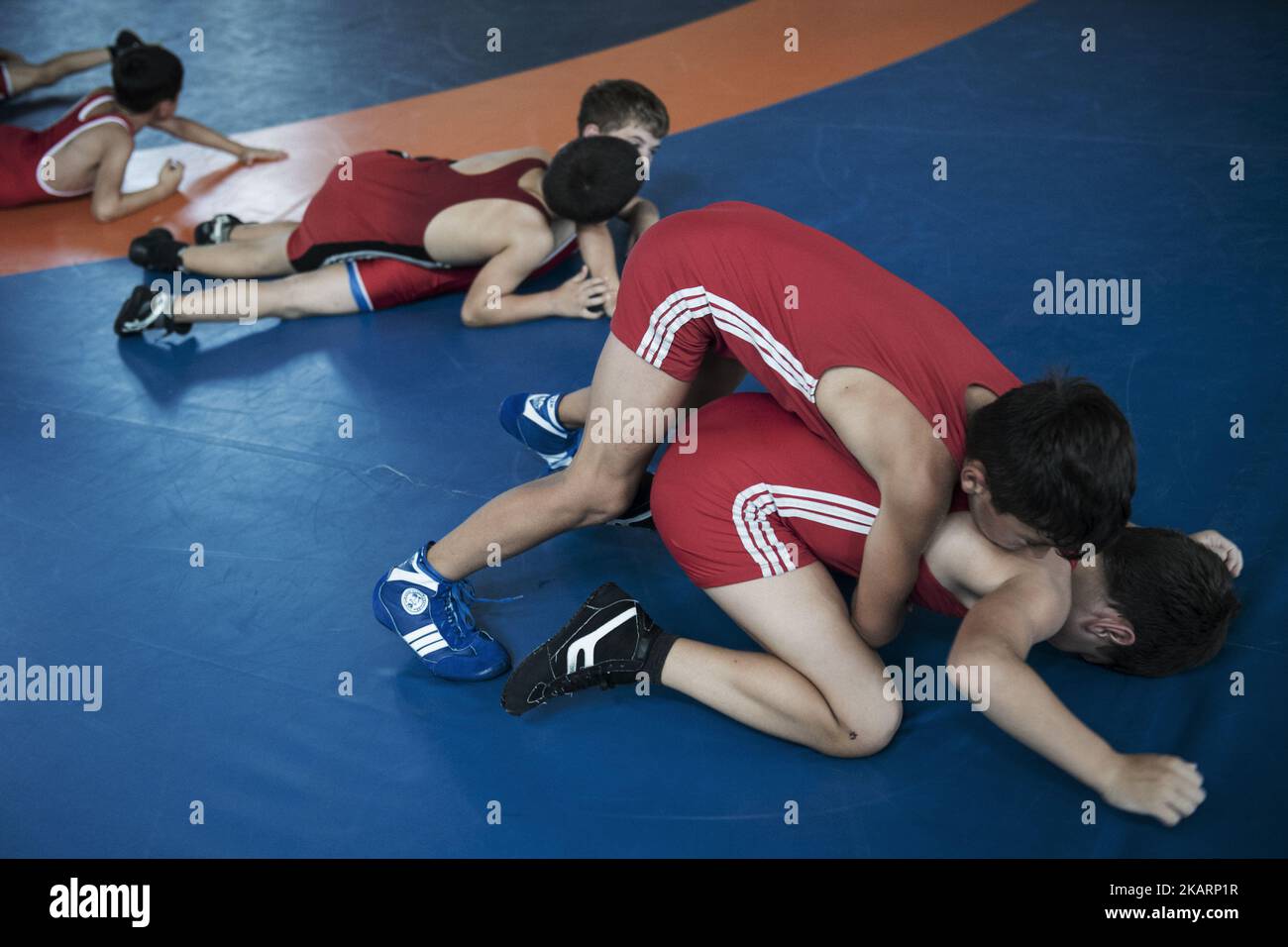Georgian wrestlers whose age is roughly between 5 and 25 have a workout ...