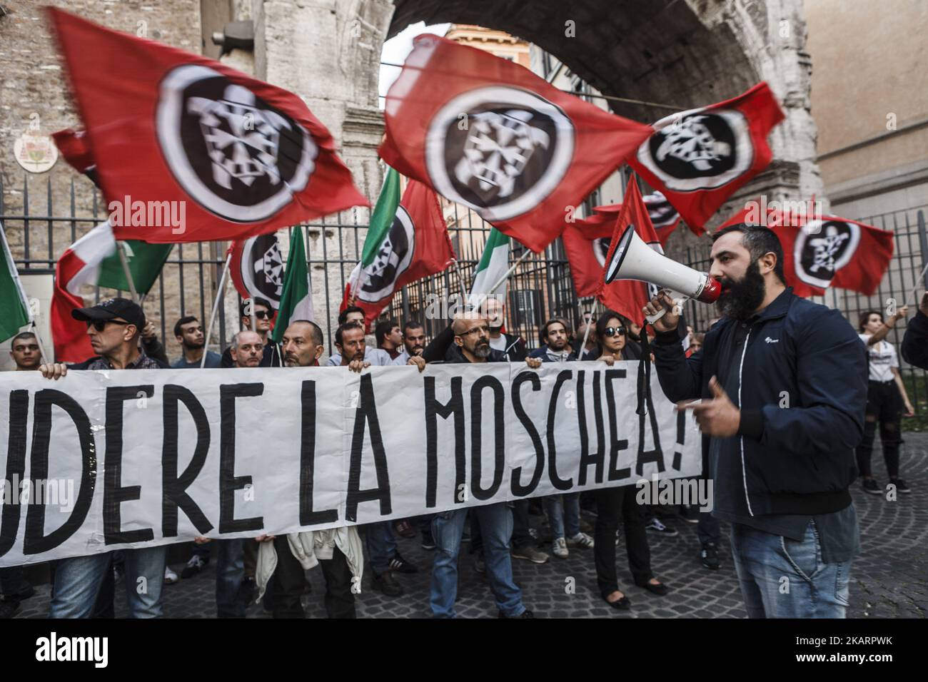 Members of Italian far-right movement CasaPound held an anti-immigrant torchlight to protest against the degradation and to ask for the closure of the abusive mosque in the multiethnic Esquilino district in Rome, Italy on October 04, 2017.(Photo by Giuseppe Ciccia/NurPhoto) Stock Photo