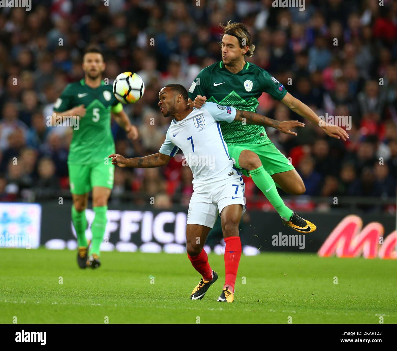 Raheem Sterling of England in action against Rene Krhin of Slovenia during FIFA World Cup Qualifying - European Region - Group F match between England and Slovenia at Wembley stadium in London, UK on October 5, 2017. (Photo by Kieran Galvin/NurPhoto) Stock Photo