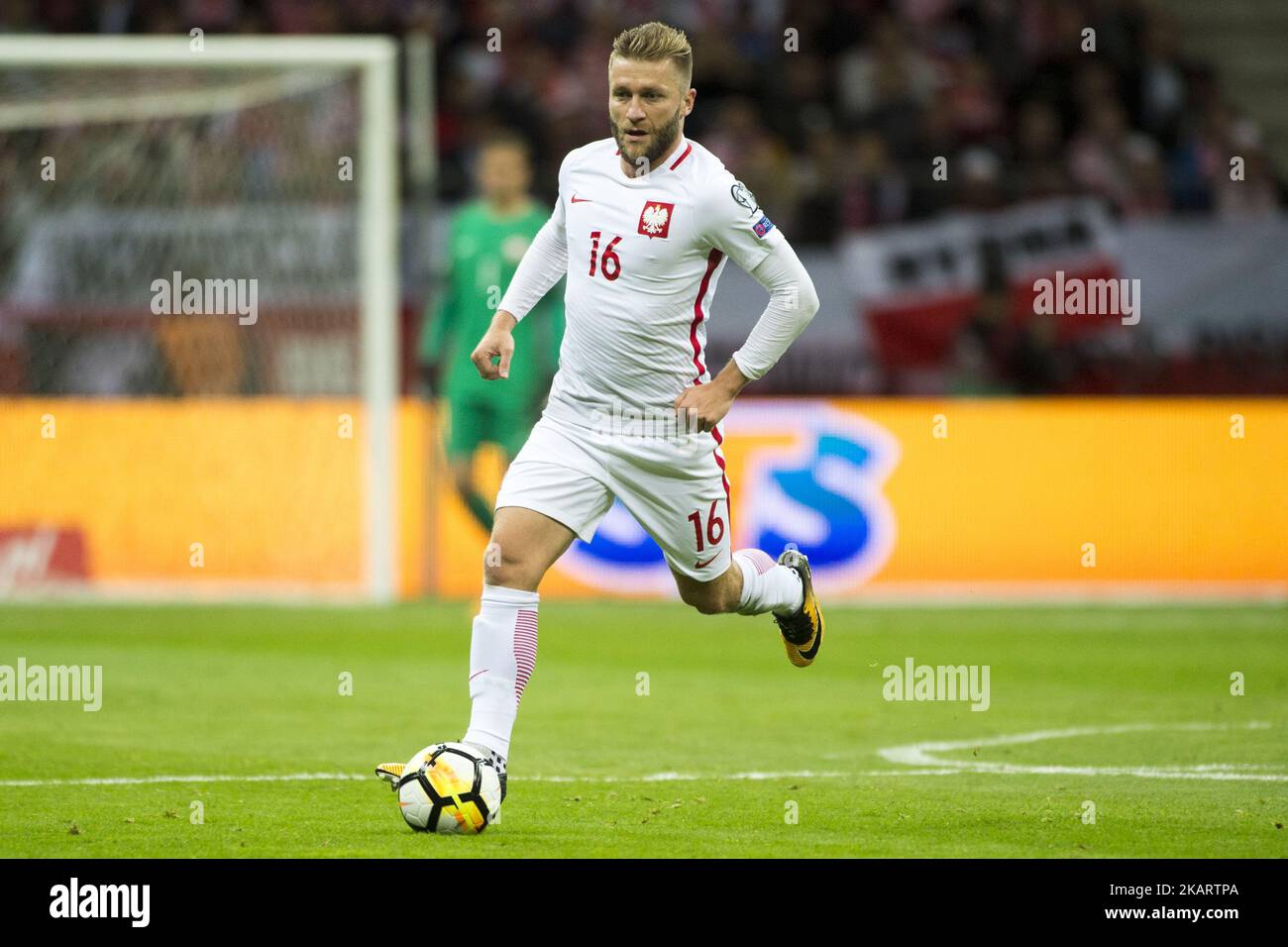 Jakub Blaszczykowski of Poland runs with the ball during the FIFA World Cup 2018 Qualifying Round Group E match between Poland and Montenegro at National Stadium in Warsaw, Poland on October 8, 2017 (Photo by Andrew Surma/NurPhoto) Stock Photo