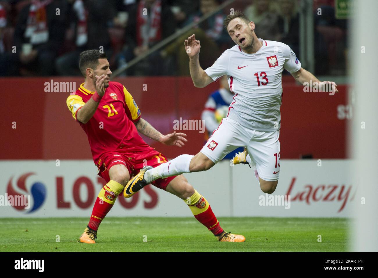 Maciej Rybus of Poland and Emrah Klimenta of Montenegro during the FIFA World Cup 2018 Qualifying Round Group E match between Poland and Montenegro at National Stadium in Warsaw, Poland on October 8, 2017 (Photo by Andrew Surma/NurPhoto) Stock Photo