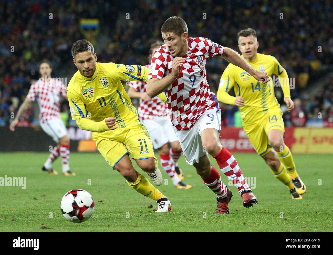 Ukraine's Marlos, left, and Croatiaâ€™s Andrej Kramaric, right, in the fight for the ball during the World Cup Group I qualifying soccer match between Ukraine and Croatia at the Olympic Stadium in Kiev, Ukraine on October 9, 2017. (Photo by Danil Shamkin/NurPhoto) Stock Photo