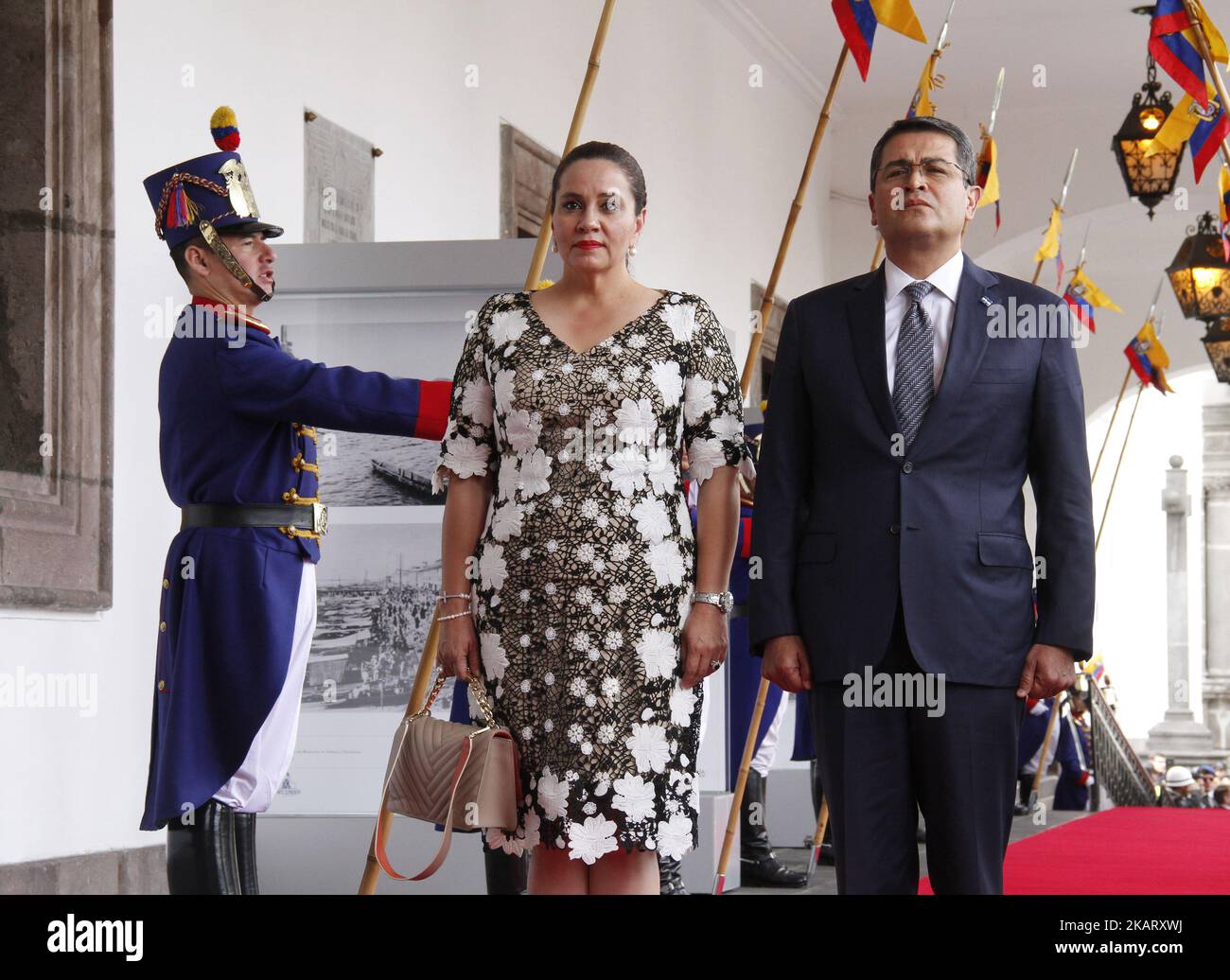 Honduras' President Juan Orlando Hernandez and first lady Ana Garcia, enter the Palace of Carondelet during a state visit, in Quito, Ecuador, October 13, 2017. (Photo by Gabriela Mena/Pressouth/NurPhoto) Stock Photo