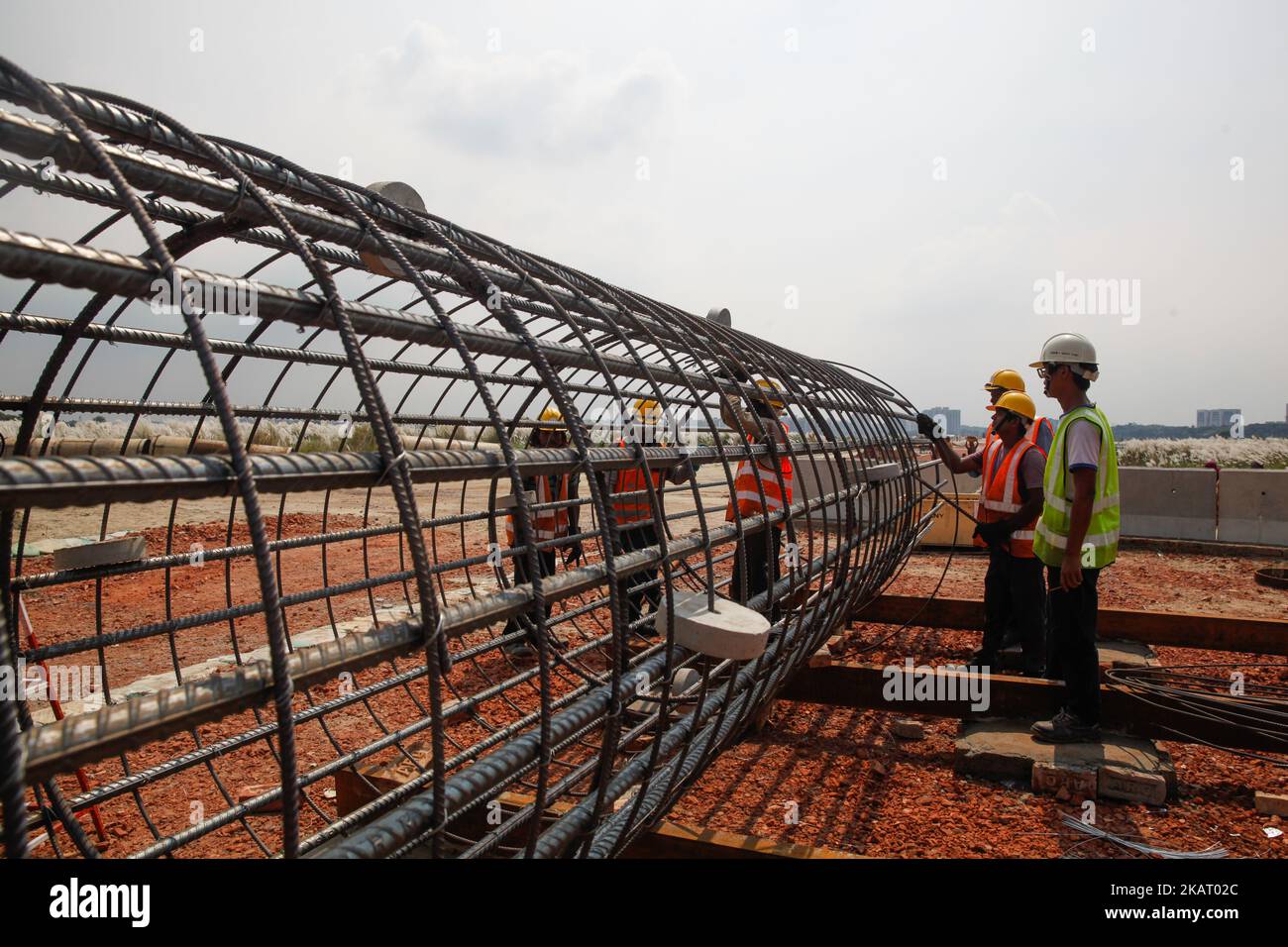 Bangladeshi construction workers working at the construction site of