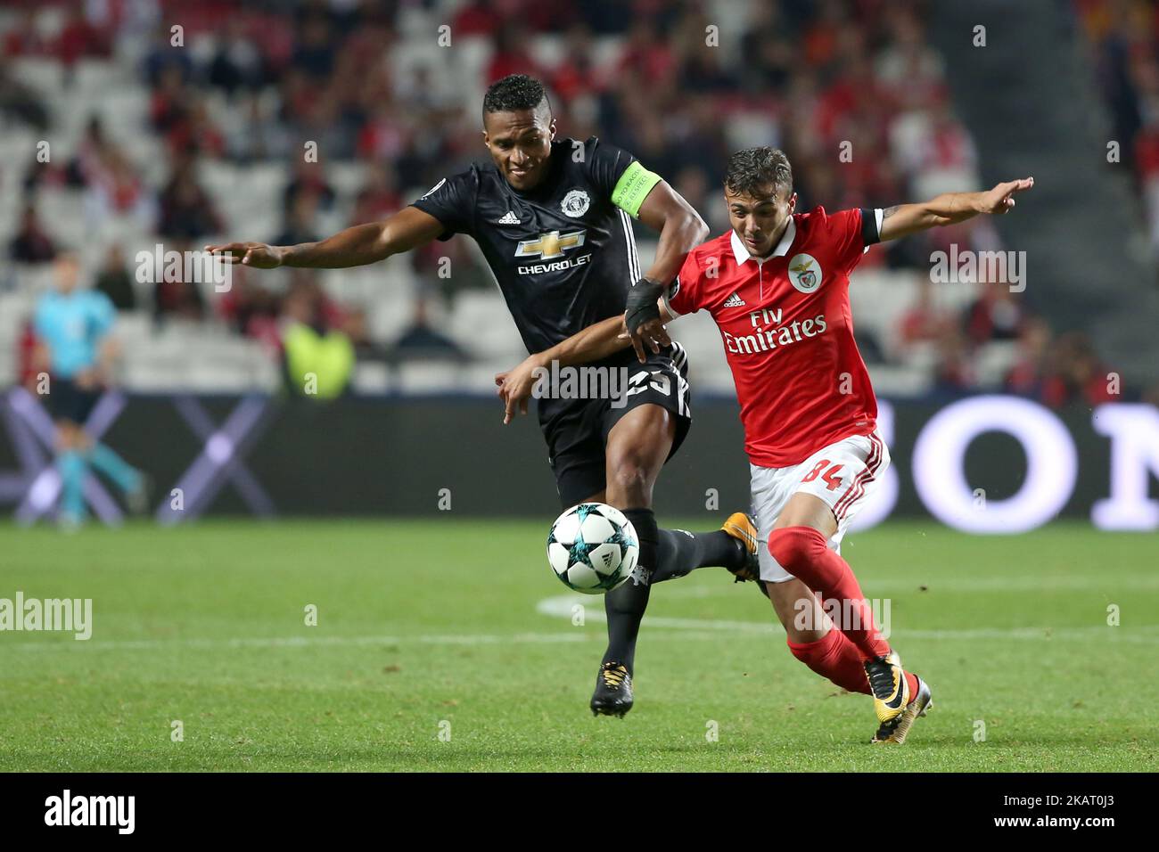 Manchester United's Ecuadorian defender Antonio Valencia (R ) fights for the ball with Benfica's Portuguese midfielder Diogo Goncalves during the UEFA Champions League football match SL Benfica vs Manchester United at the Luz stadium in Lisbon, Portugal on October 18, 2017. ( Photo by Pedro FiÃºza/NurPhoto) Stock Photo