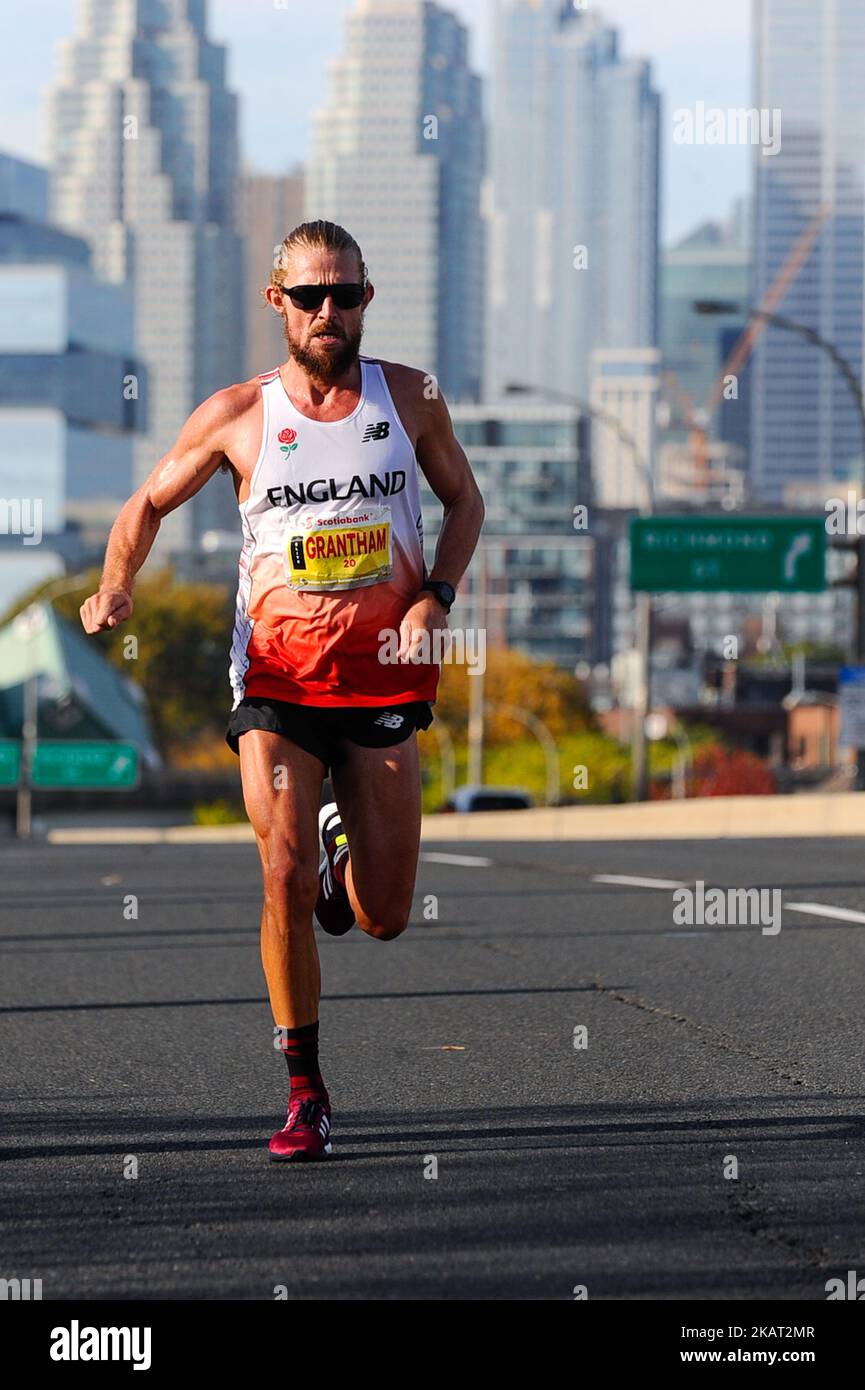 Runner Lee Grantham from England competes Scotiabank Toronto Waterfront Marathon races on October 22, 2017 in Toronto, Canada. More than 25,000 people ran in three Scotiabank Toronto Waterfront Marathon. Kenyan runner Philemon Rono ran a historic Scotiabank Toronto Waterfront Marathon crossing the finish line at 2:06:51 — winning the race and setting a new record for the fastest marathon run on Canadian soil. (Photo by Anatoliy Cherkasov/NurPhoto) Stock Photo