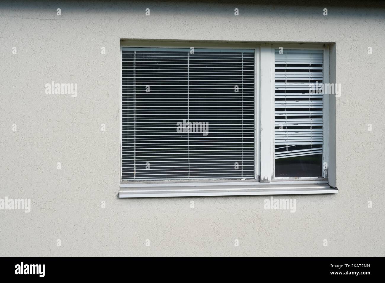 Closed window with a wooden frame with intern shutters Stock Photo - Alamy