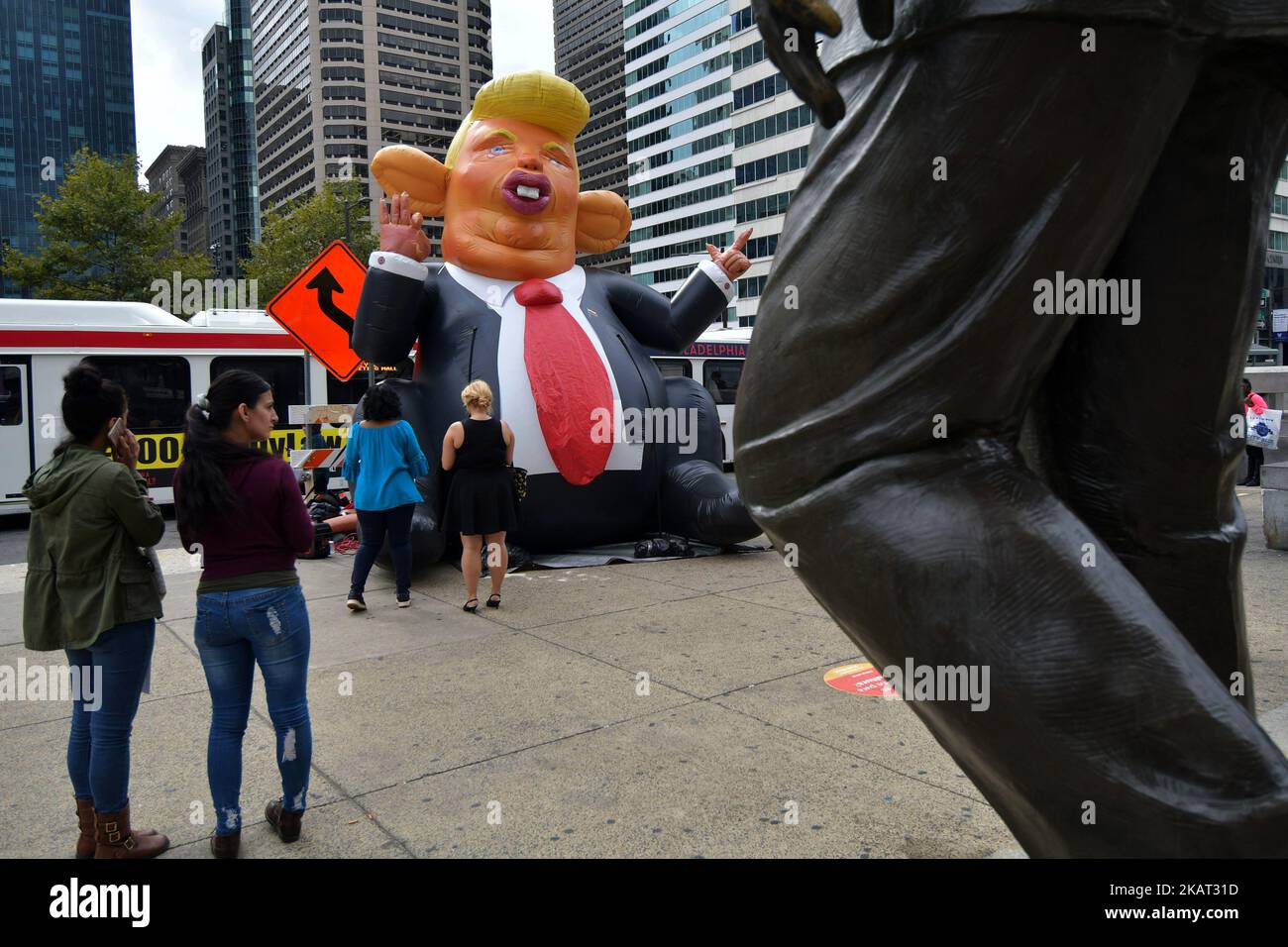A popup inflatable 'Trump Rat' is erected facing the Frank Rizzo