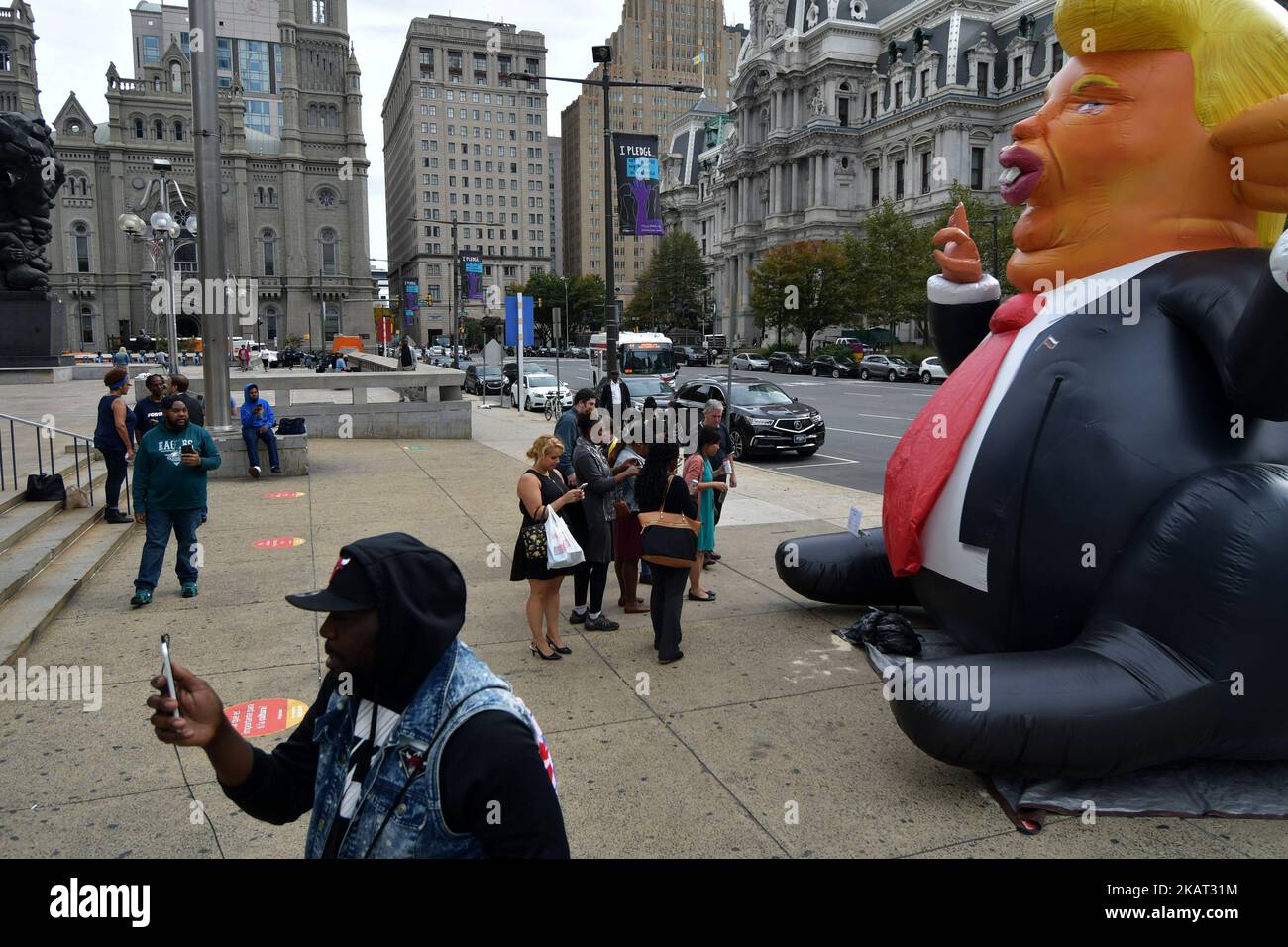 A popup inflatable 'Trump Rat' is erected facing the Frank Rizzo
