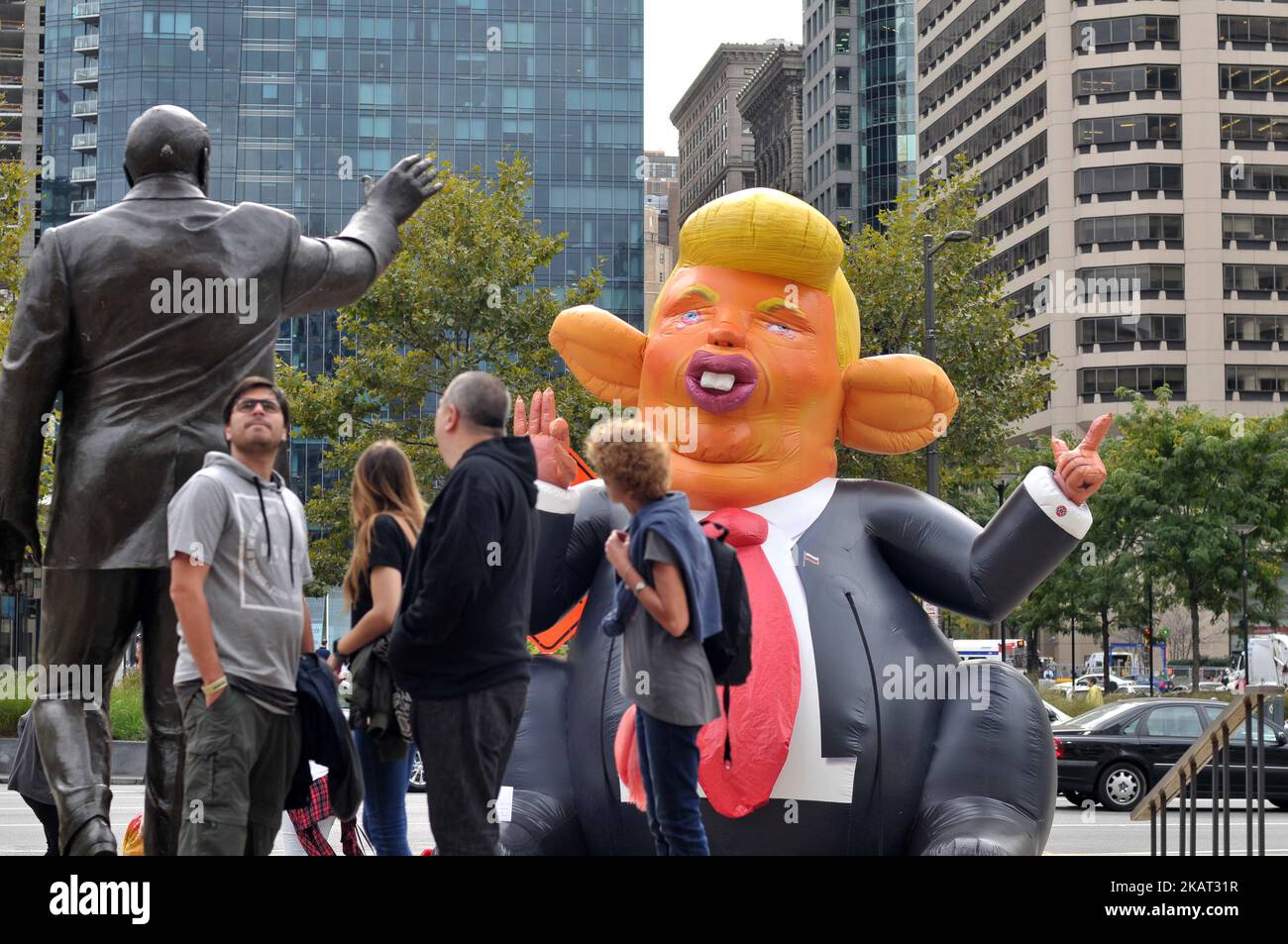 A popup inflatable 'Trump Rat' is erected facing the Frank Rizzo