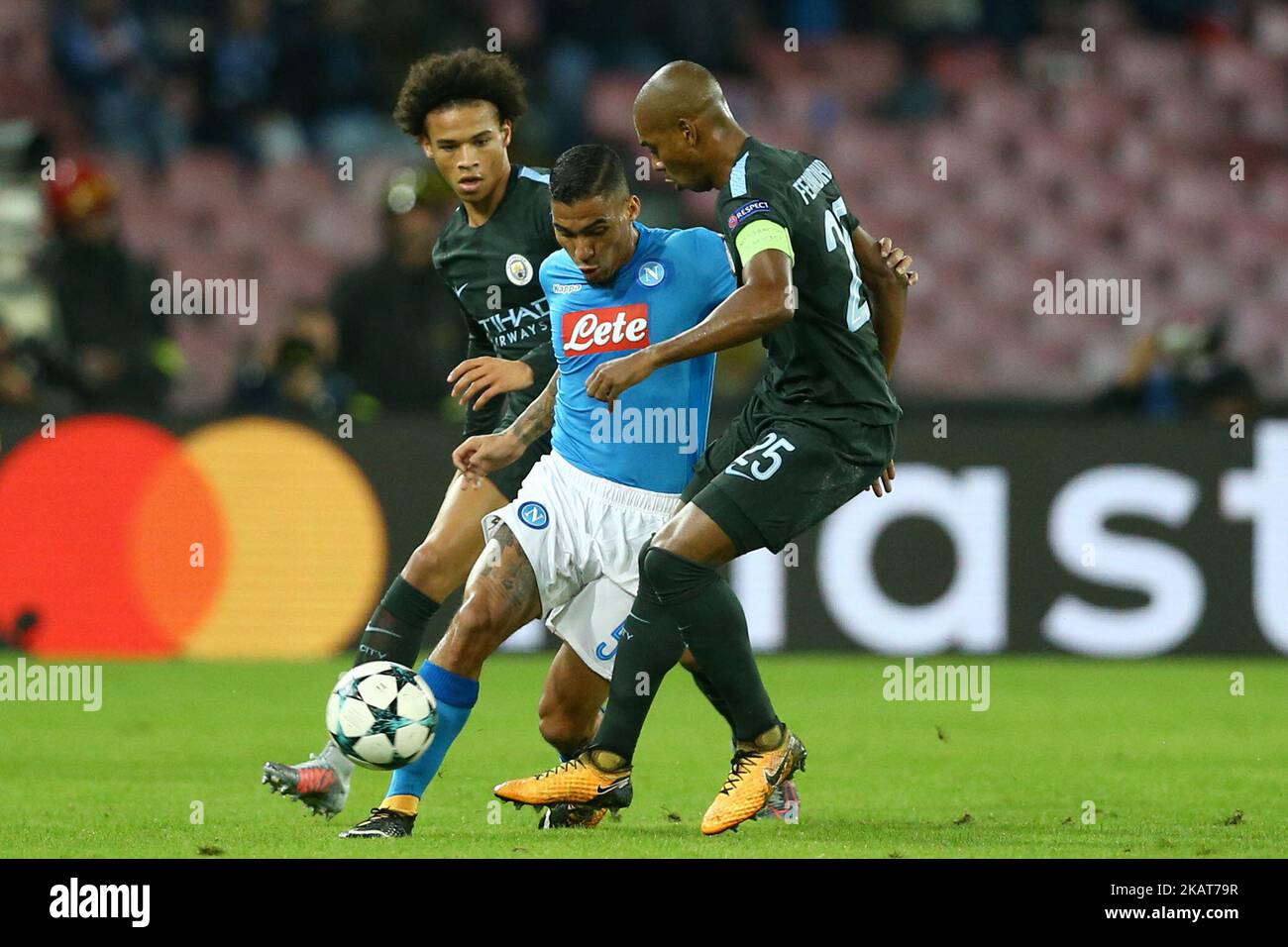Allan Loudeiro of Napoli in action between Leroy San of Manchester City Allan Loudeiro of Napoli in action between Leroy San of Manchester City