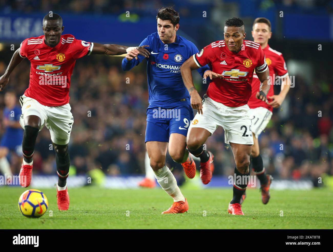 L-R Manchester United's Eric Bailly, Chelsea's Alvaro Morata and Manchester United's Luis Antonio Valencia during the Premier League match between Chelsea and Manchester United at Stamford Bridge in London, England on November 5, 2017. (Photo by Kieran Galvin/NurPhoto) Stock Photo