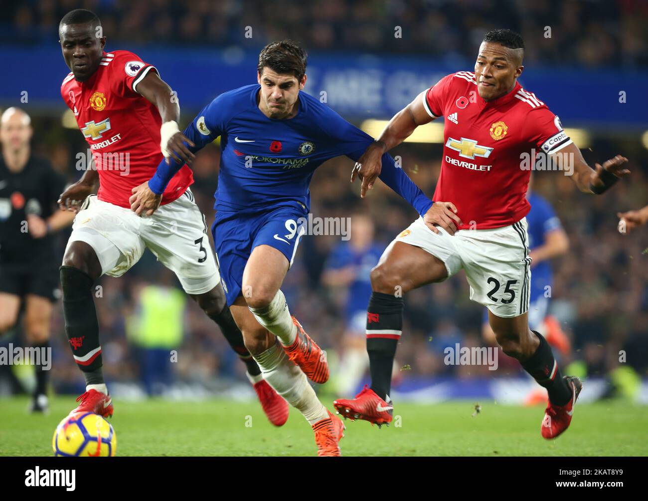 L-R Manchester United's Eric Bailly, Chelsea's Alvaro Morata and Manchester United's Luis Antonio Valencia during the Premier League match between Chelsea and Manchester United at Stamford Bridge in London, England on November 5, 2017. (Photo by Kieran Galvin/NurPhoto)  Stock Photo