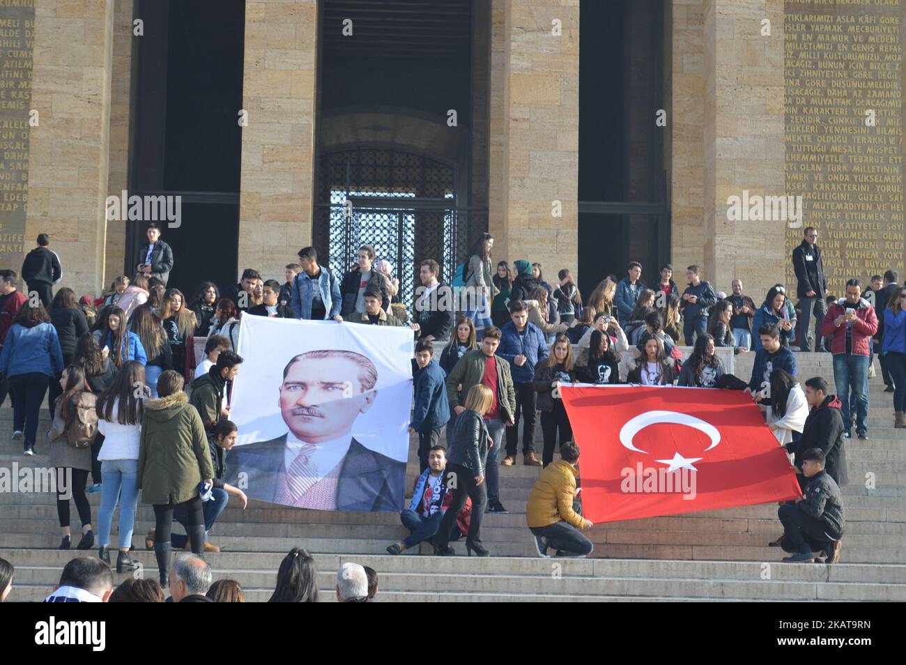 A photo taken in Ankara, Turkey on November 8, 2017 shows that a group of high school students poses with a Turkish flag and a portrait of Mustafa Kemal Ataturk as they visit Anitkabir, the Mausoleum of founder and first president of modern Turkey Mustafa Kemal Ataturk, prior to the 79th anniversary of his death on November 10. Turkish citizens commemorate the death anniversary of Ataturk, the national hero of modern Turkey, who passed away 79 years ago, at 9:05 A.M. on November 10, 1938 at the age of 57. Photo was taken on November 8, and was issued on November 9. (Photo by Altan Gocher/NurPh Stock Photo