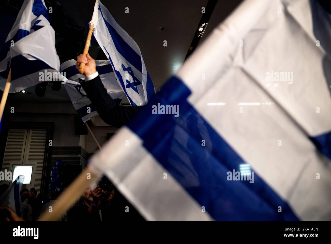 Jerusalem, Israel. 01st Nov, 2022. A fisted hand holding the Israel flag during celebrations at the “Otzma Yehudit” far-right party elections headquarters following the first exit polls of the 2022 general elections, the fifth parliamentary elections in less than four years. Credit: SOPA Images Limited/Alamy Live News Stock Photo