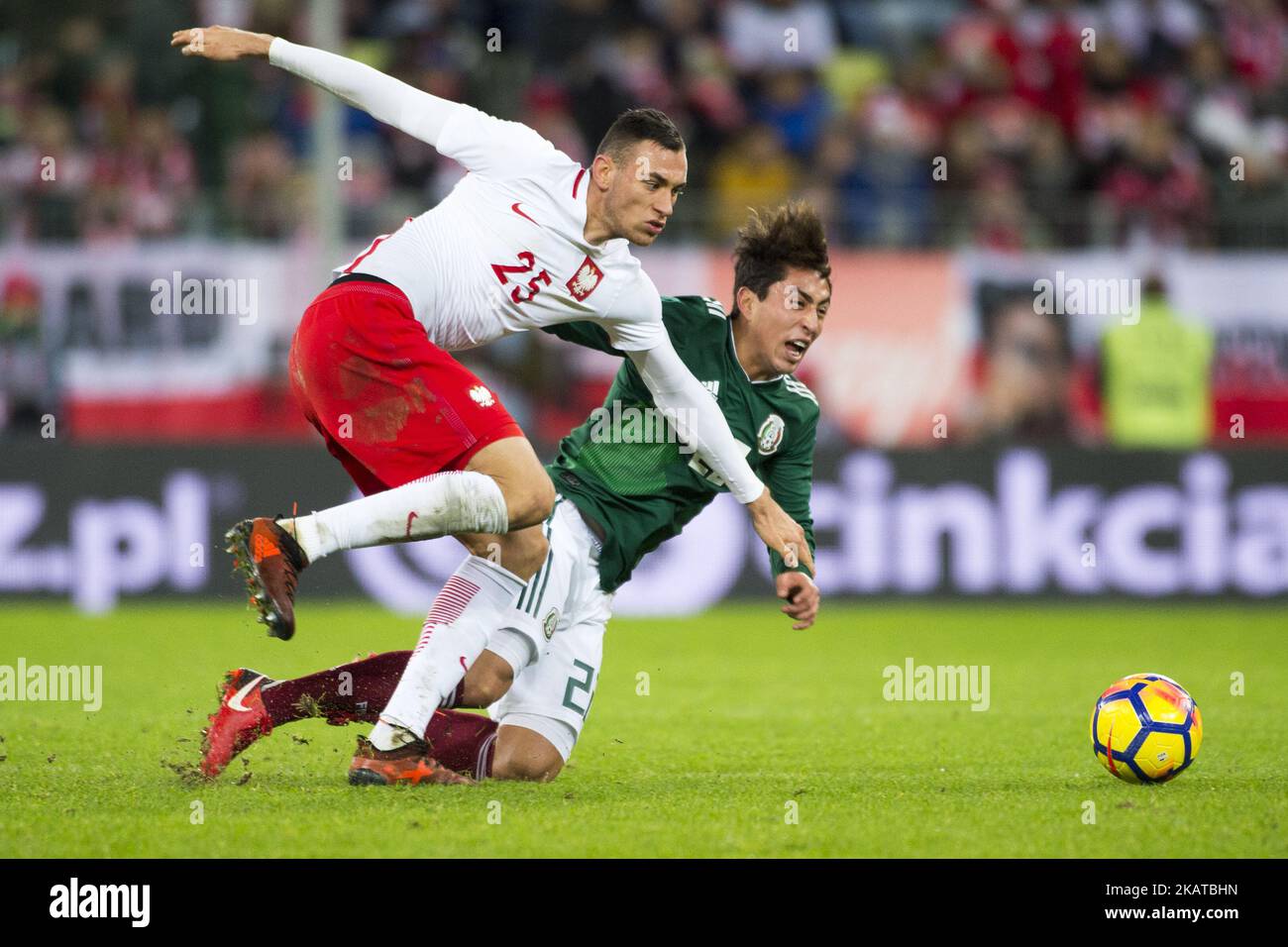Omar Govea of Mexico fouled by Jaroslaw Jach of Poland during the International Friendly match between Poland and Mexico at Energa Stadium in Gdansk, Poland on November 13, 2017 (Photo by Andrew Surma/NurPhoto) Stock Photo