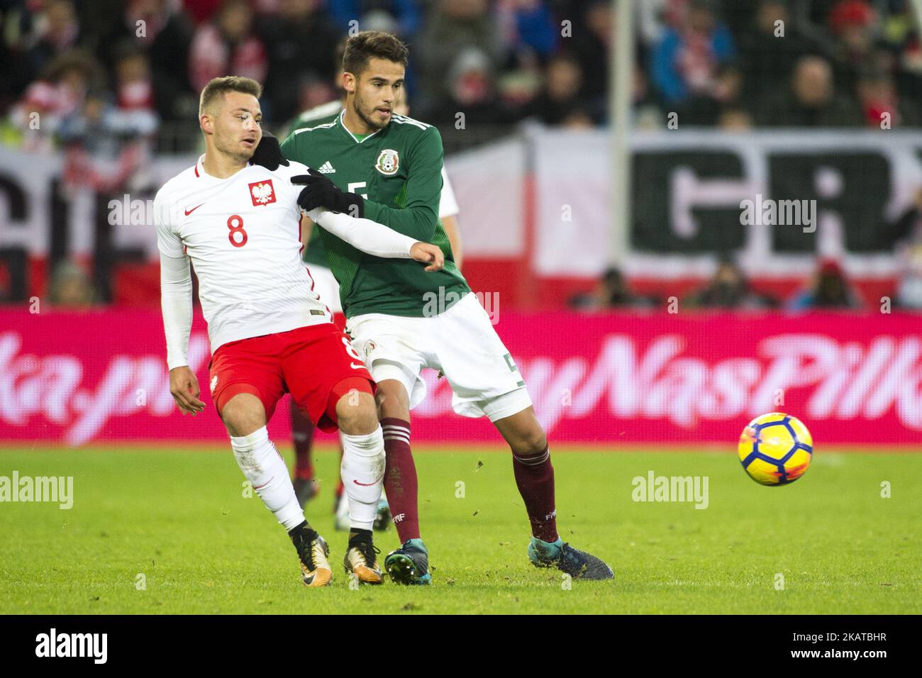 Karol Linetty of Poland and Diego Reyes of Mexico fight for the ball during the International Friendly match between Poland and Mexico at Energa Stadium in Gdansk, Poland on November 13, 2017 (Photo by Andrew Surma/NurPhoto) Stock Photo