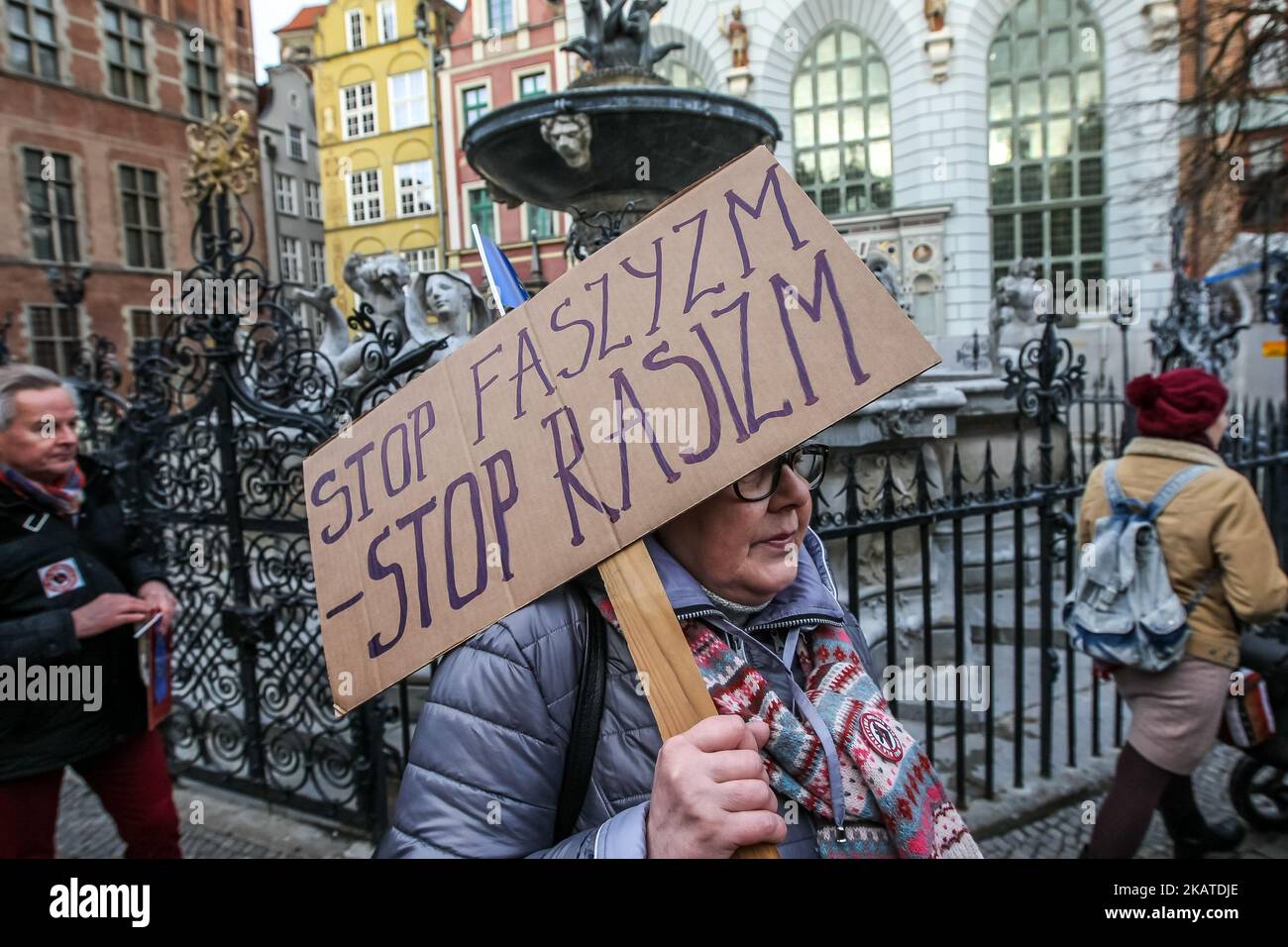 Anti-fascist rally participant with STOP fascism, stop racism banner is seen in Gdansk, Poland on 19 November 2017 People protested against the growing wave of nationalism and racism in Poland. (Photo by Michal Fludra/NurPhoto) Stock Photo