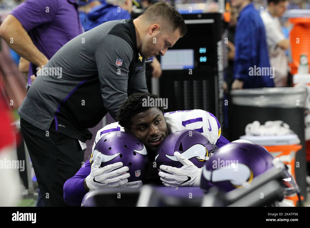 Minnesota Vikings wide receiver Laquon Treadwell (11) rests his head over two helmets as he is worked on by Vikings staff during the first half of an NFL football game against the Detroit Lions in Detroit, Michigan USA, on Thursday, November 23, 2017. (Photo by Jorge Lemus/NurPhoto) Stock Photo
