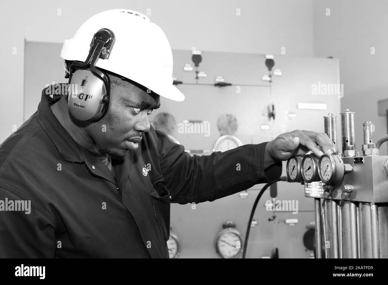 Electrical Engineer checking gauge equipment in Johannesburg, South