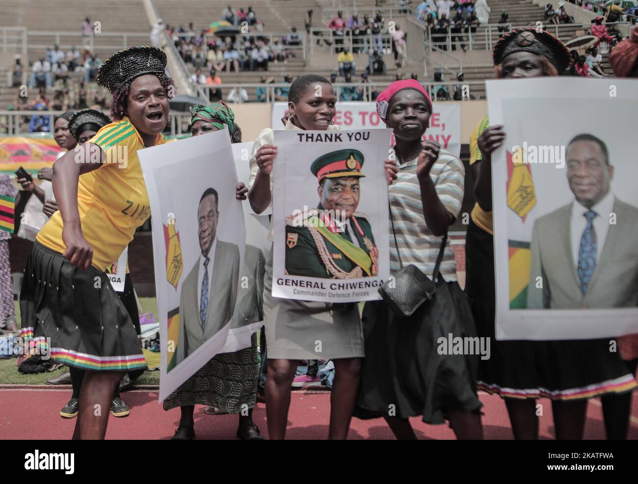 Zimbabwe Inauguration Supporters hold posters of Zimbabwean newly sworn-in President Emmerson ...