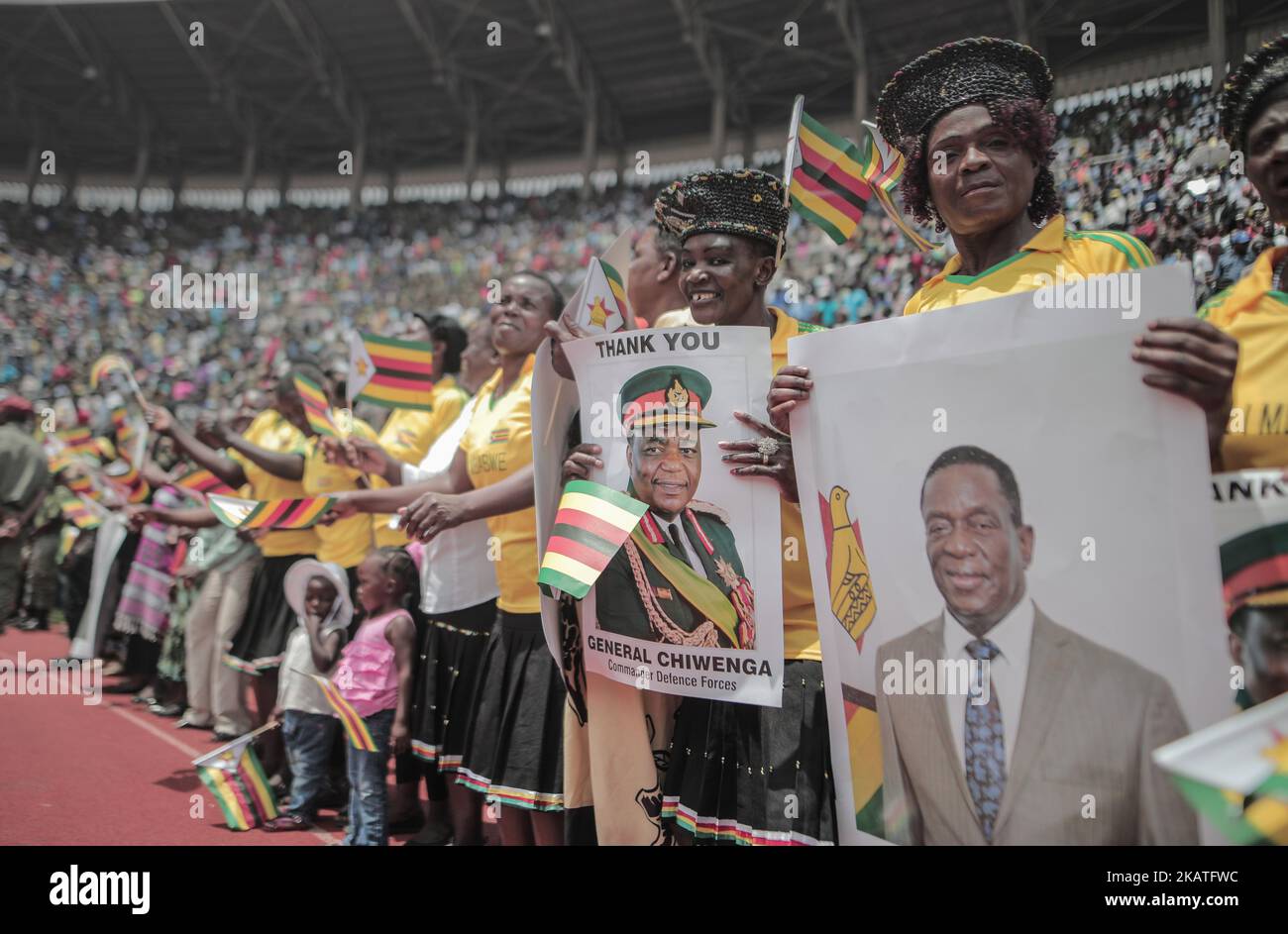 Zimbabwe Inauguration Supporters hold posters of Zimbabwean newly sworn-in President Emmerson ...