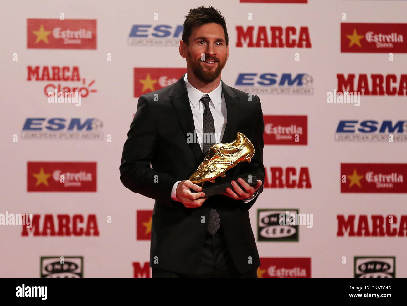 Lionel Messi receives his fourth Golden Boot award on November 24, 2017 for leading all of Europe's leagues in scoring last season. It was his fourth award matching Cristiano Ronaldo as the award record-holders; Messi won the award by Scoring 37 goals in the Spanish league in 2016-17 season(Photo by Urbanandsport/NurPhoto) Stock Photo