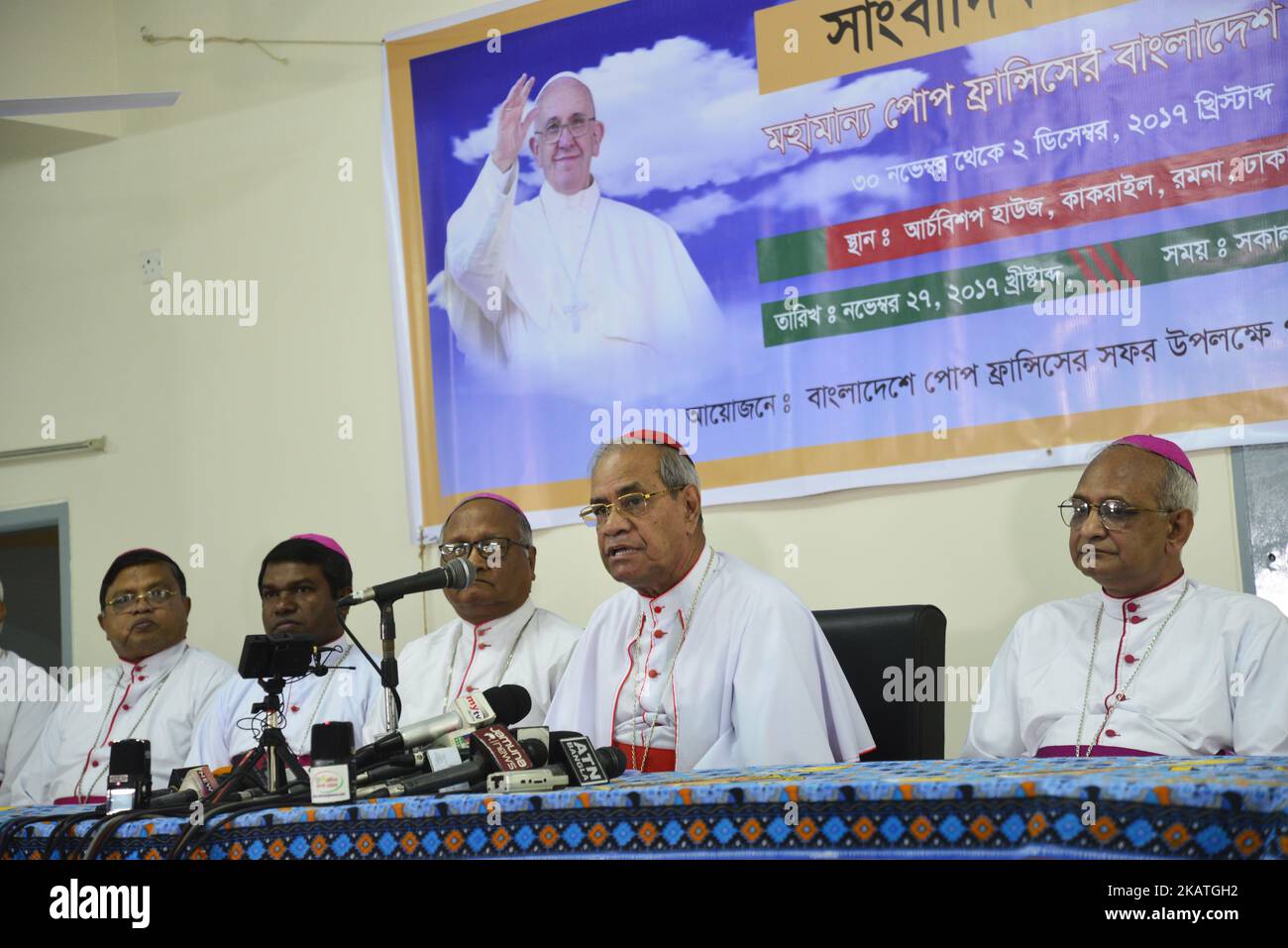 Pope Francis will visit Dhaka from November 30 to December 2, which comes after his visit to Myanmar, Cardinal Patrick D' Rozario (C) says at a press conference at Ramna Cathedral on Monday, November 27, 2017.'They are praying and preparing to join a mass [prayer service] at the Suhrawardy Udyan on December 1,' Cardinal Patrick D' Rozario said.Around 80,000 Christians are expected to attend the service, Cardinal added. On November 30, Pope would visit the National Martyrs' Monument in Savar, Bangabandhu Memorial Museum in Dhanmondi, meet the president, officials, diplomats and civil society me Stock Photo