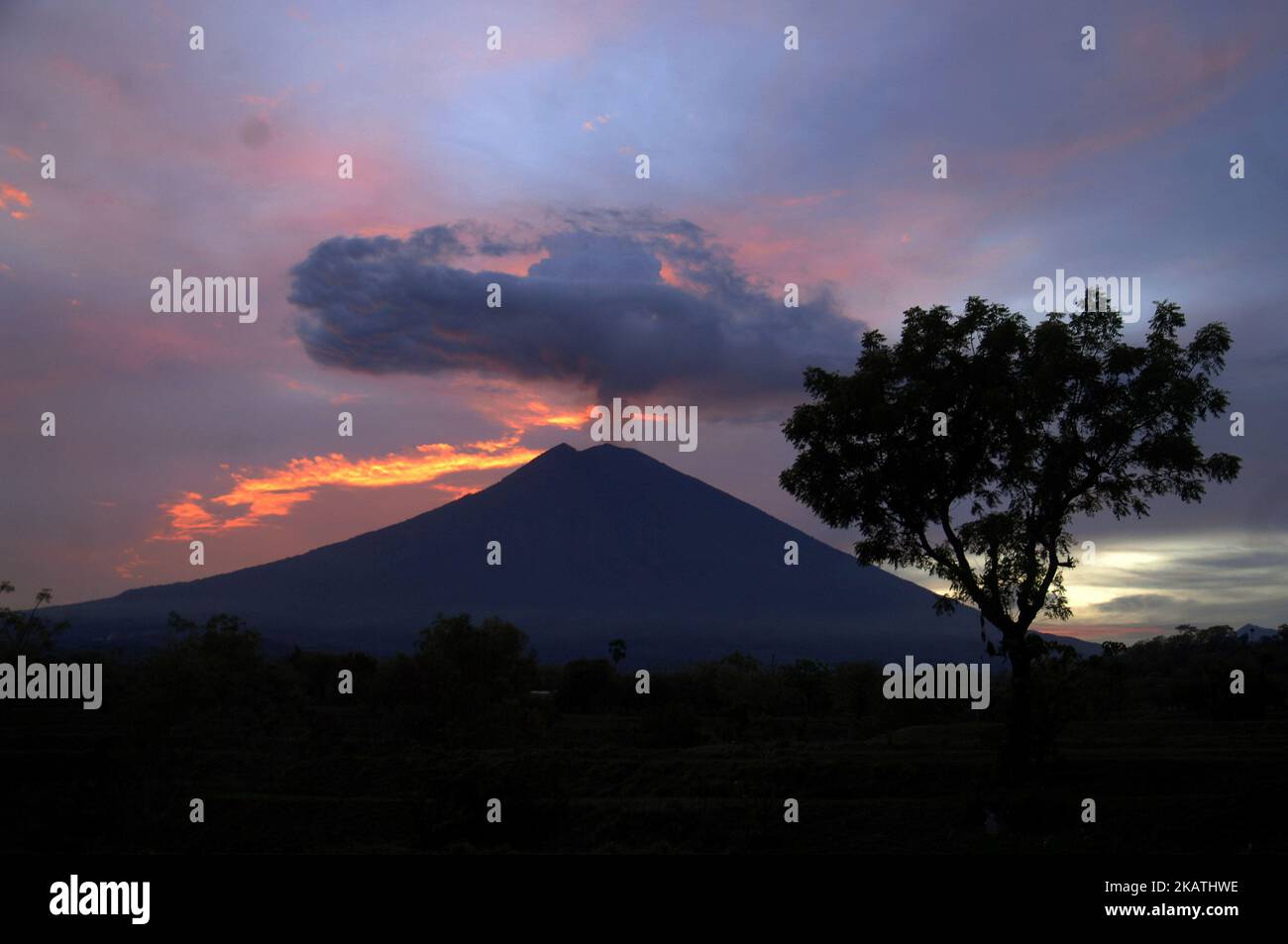 Panorama of Mount Agung viewed from Tulamben, Karangasem, Bali, November, 30,2017. The Center for Volcanology and Geological Hazard Mitigation Indonesia, said Mount Agung entered the phase of quiet period. (Photo by Dasril Roszandi/NurPhoto) Stock Photo