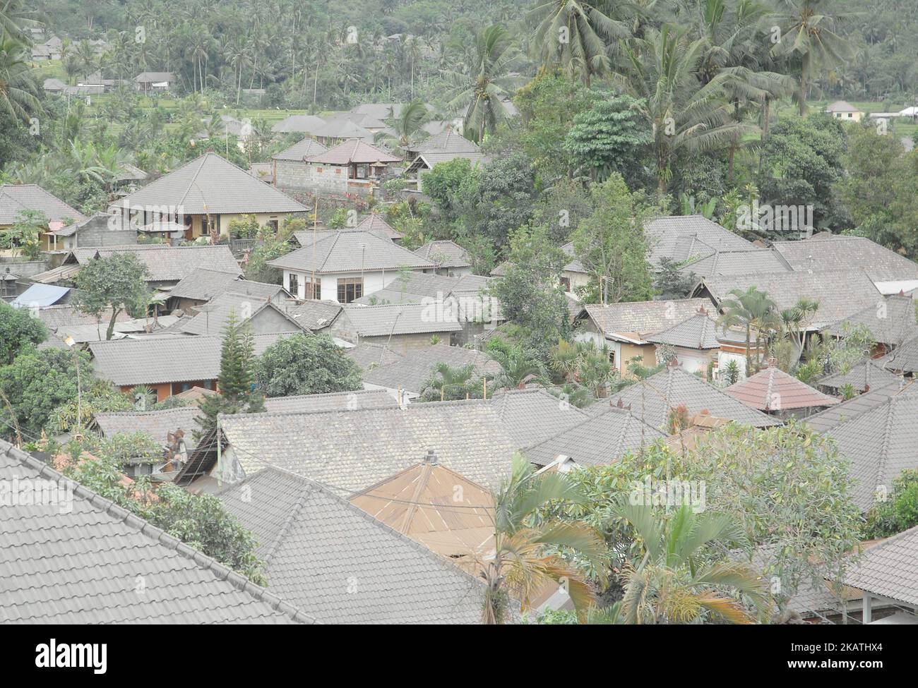Volcanic ash of Mount Agung eruption looks enveloped the house of citizens in the area Bebandem, Karangasem, Bali, on November 30,2017. Bebandem area is the worst hit by eruption ash eruption of Mount Agung with a distance of 8 kilometers or around the red zone so that the village is deserted at leave the occupants of the house to the safe zone. considering that in 1963 Mount Agung erupted and killed 280 people who did not want to evacuate. (Photo by Dasril Roszandi/NurPhoto) Stock Photo