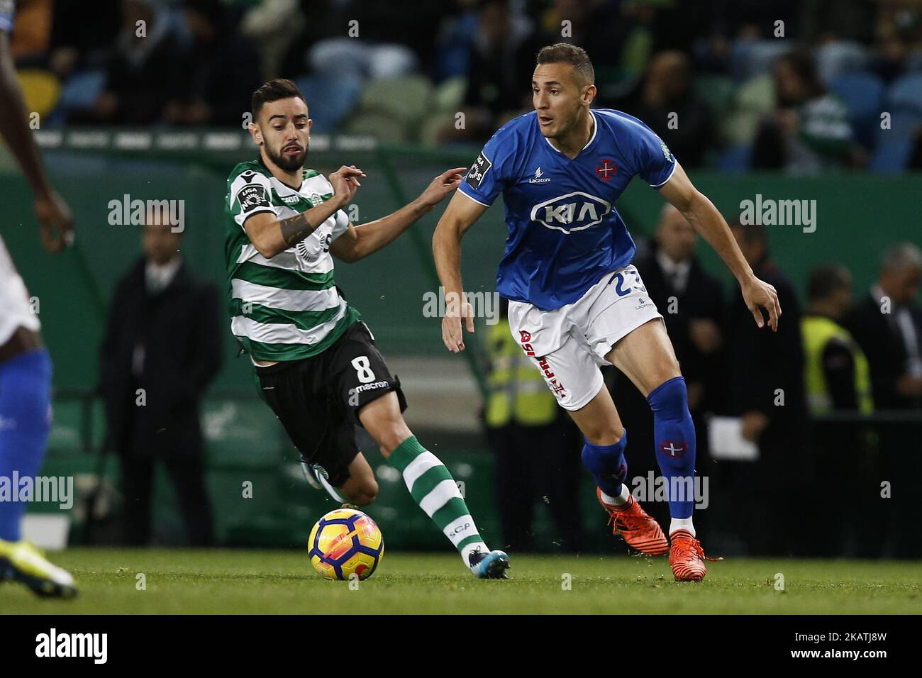 Sporting's midfielder Bruno Fernandes (L) vies for the ball with Belenenses's midfielder Hassan Yebda (R) during Primeira Liga 2017/18 match between Sporting CP vs CF Belenenses, in Lisbon, on December 1, 2017. (Photo by Carlos Palma/NurPhoto) Stock Photo
