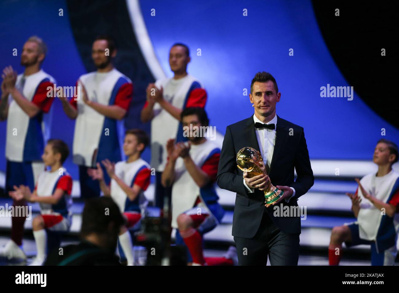 Miroslav Klose holds the World Cup trophy on stage before the Final Draw for the 2018 FIFA World Cup at the State Kremlin Palace on December 01, 2017 in Moscow, Russia. (Photo by Igor Russak/NurPhoto) Stock Photo