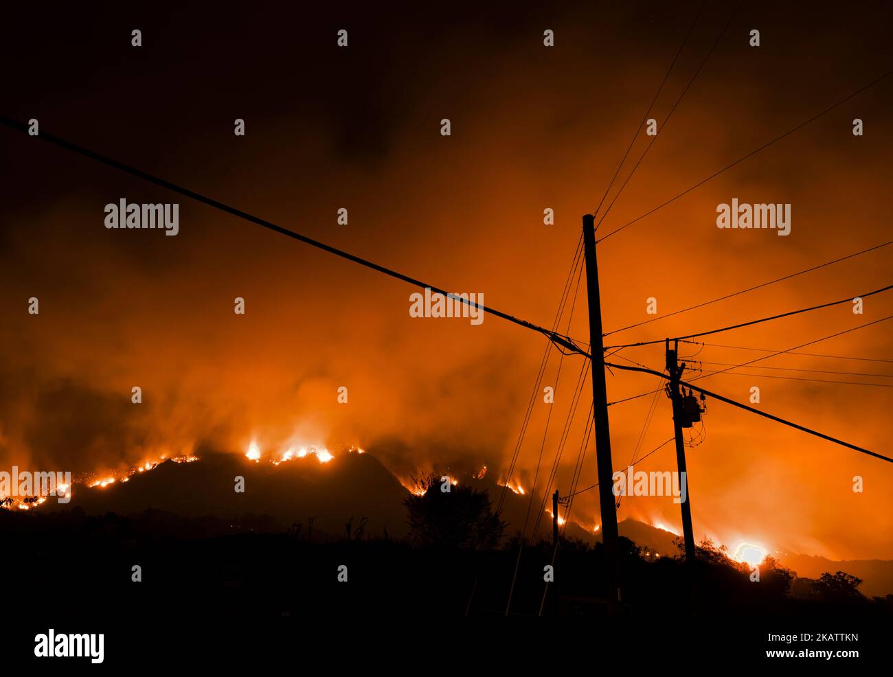 The Thomas wildfire burns in Carpinteria, California on December 11, 2017. The fire destroyed