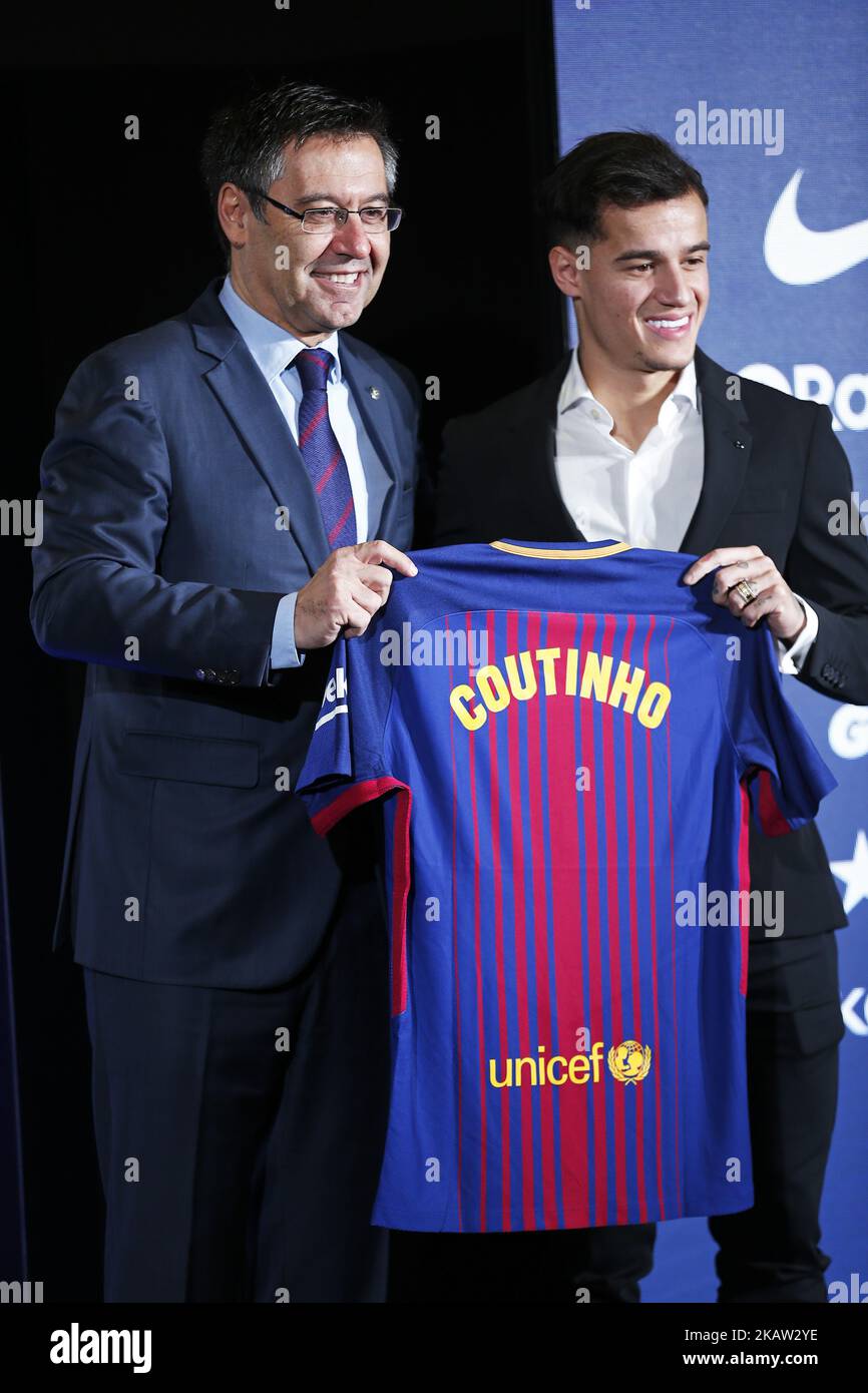 New Barcelona signing Philippe Coutinho (R) and Josep Maria Bartomeu, President of Barcelona (L) pose with his shirt at Camp Nou on January 8, 2018 in Barcelona, Spain. The Brazilian player signed from Liverpool, has agreed a deal with the Catalan club until 2023 season. (Photo by Urbanandsport/NurPhoto) Stock Photo