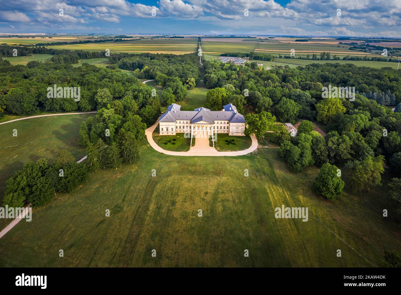 Deg, Hungary - Aerial view of the famous Festetics Palace, classicist castle surrounded by the largest English park in Fejer County on a summer mornin Stock Photo