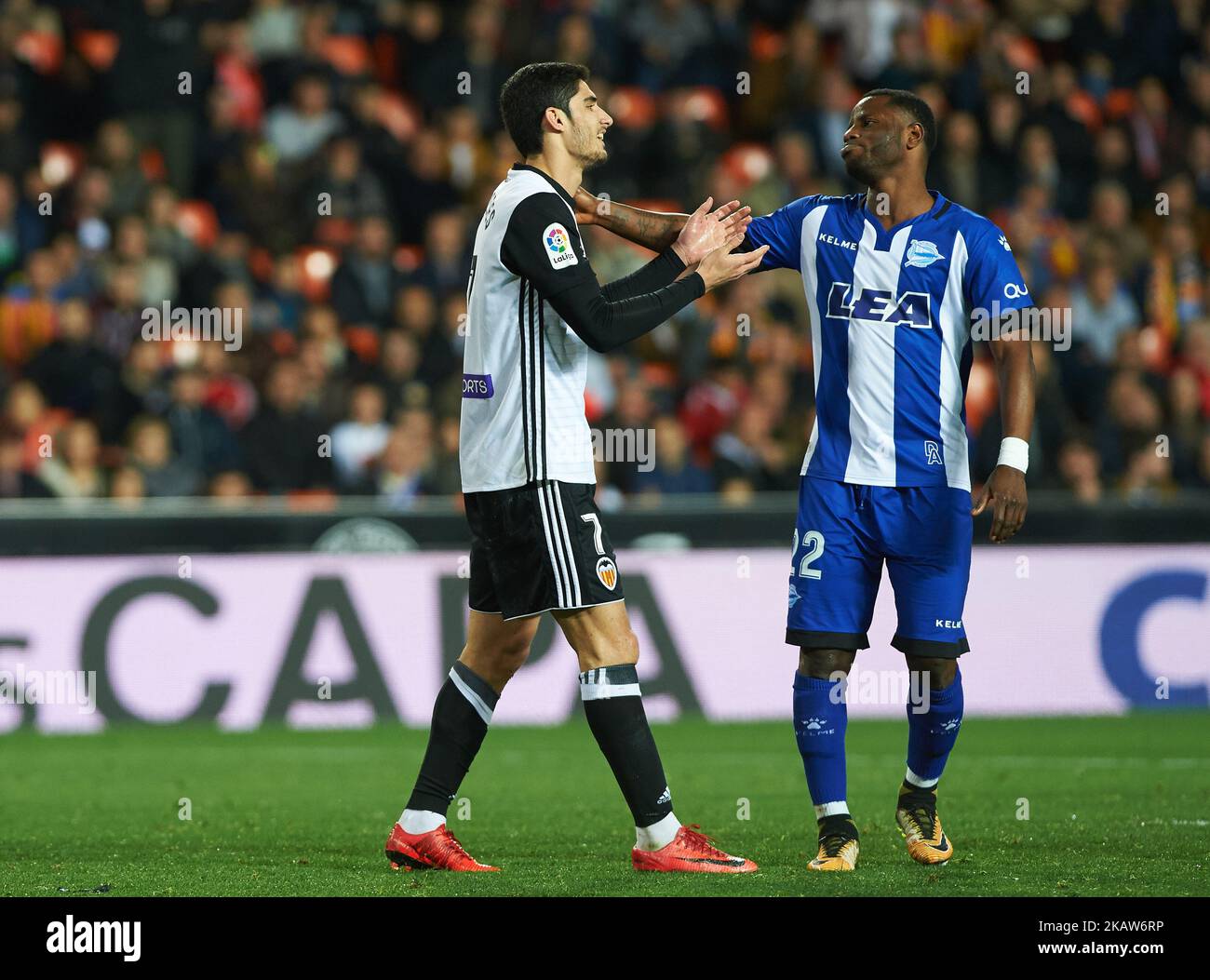 Gonzalo Guedes of Valencia CF and Wakaso Mubarak of Deportivo Alaves during the Spanish Copa del Rey, Round of 8, match between Valencia CF and Deportivo Alaves at Estadio de Mestalla on jenuary 17, 2018 in Valencia, Spain. (Photo by Maria Jose Segovia/NurPhoto) Stock Photo
