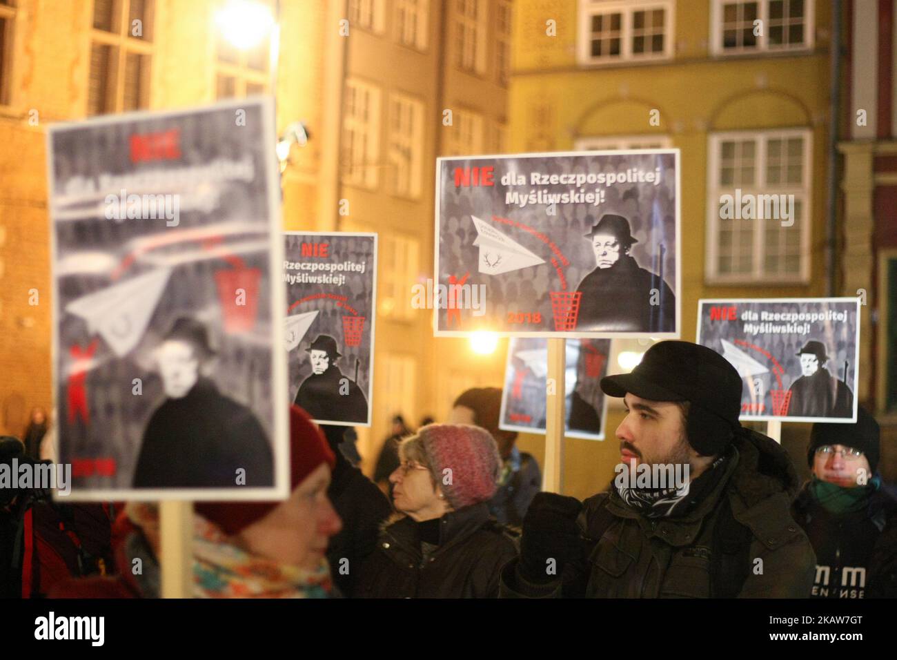 Protesters holding banners, with anti-hunting slogans are seen in Gdansk, Poland on 19 January 2018 Over 200 people protested against new hunting law introduced by the Law and Justice (PiS) government. They demand to ban participation of children in hunting, increase of the distance allowed for hunting from houses and private properties, and elimination of punishment for so called disturbing in hunting (Photo by Michal Fludra/NurPhoto) Stock Photo