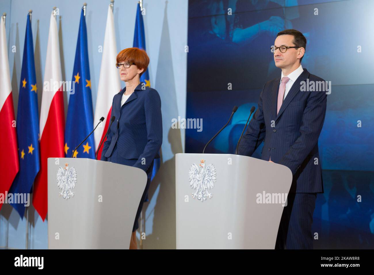 Prime Minister of Poland Mateusz Morawiecki and Minister of Labour and Social Policy Elzbieta Rafalska during the press conference at Chancellery of the Prime Minister in Warsaw, Poland on 23 January 2018. (Photo by Mateusz Wlodarczyk/NurPhoto) Stock Photo