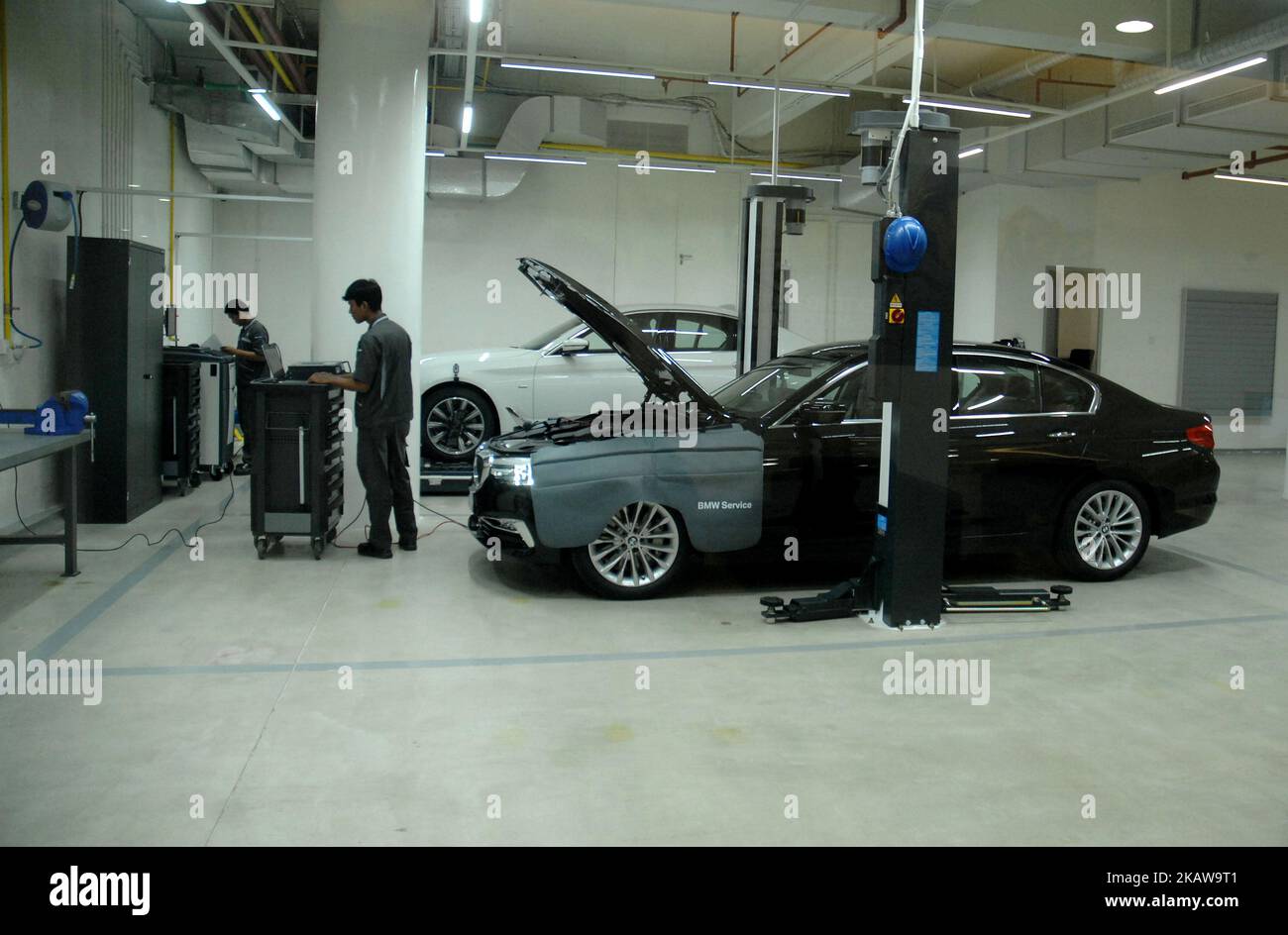 JAKARTA, INDONESIA, JAN25 Technicians repair service vehicles and