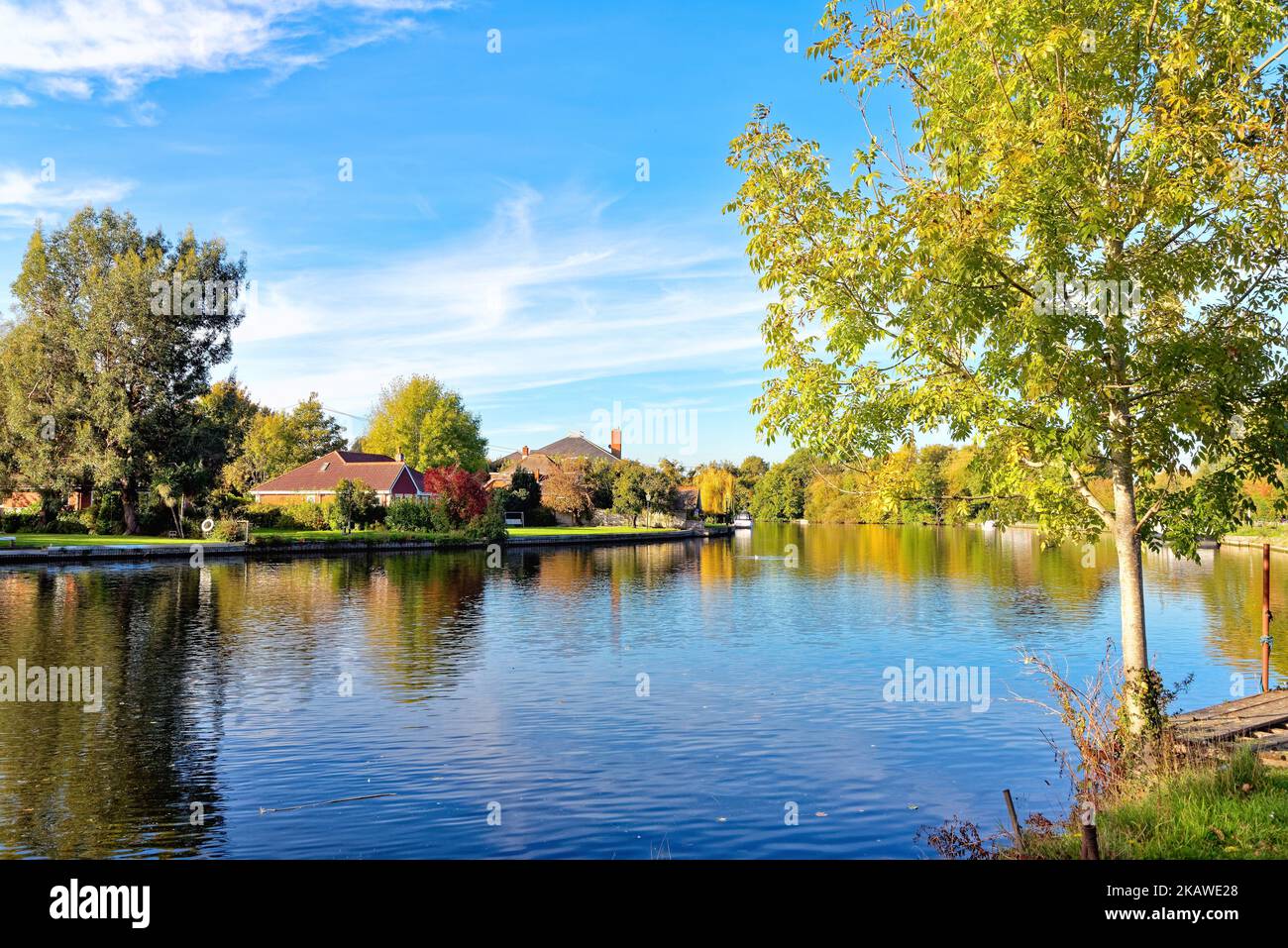 The riverside at Shepperton on a calm autumn day Surrey England UK