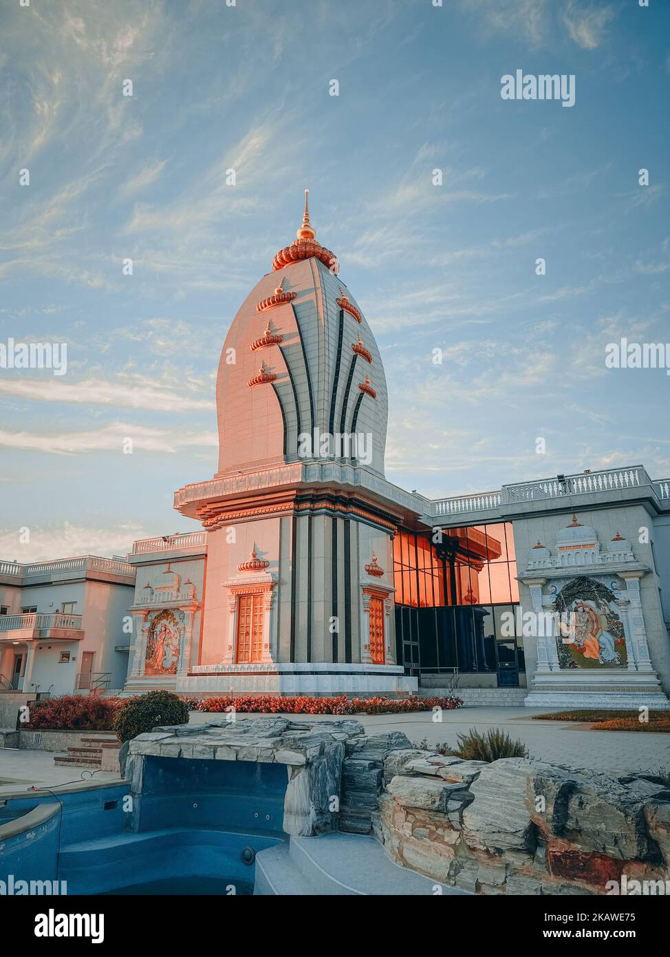 A vertical shot of Radha Madhav Dham temple in Austin, Texas at sunset