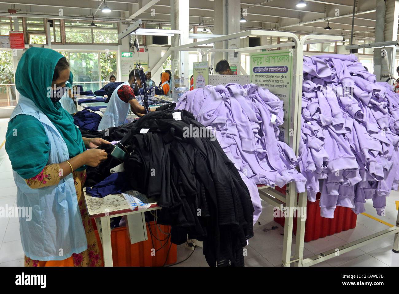 Dhaka, Bangladesh,On November 02, 2022. Bangladeshi worker works at a